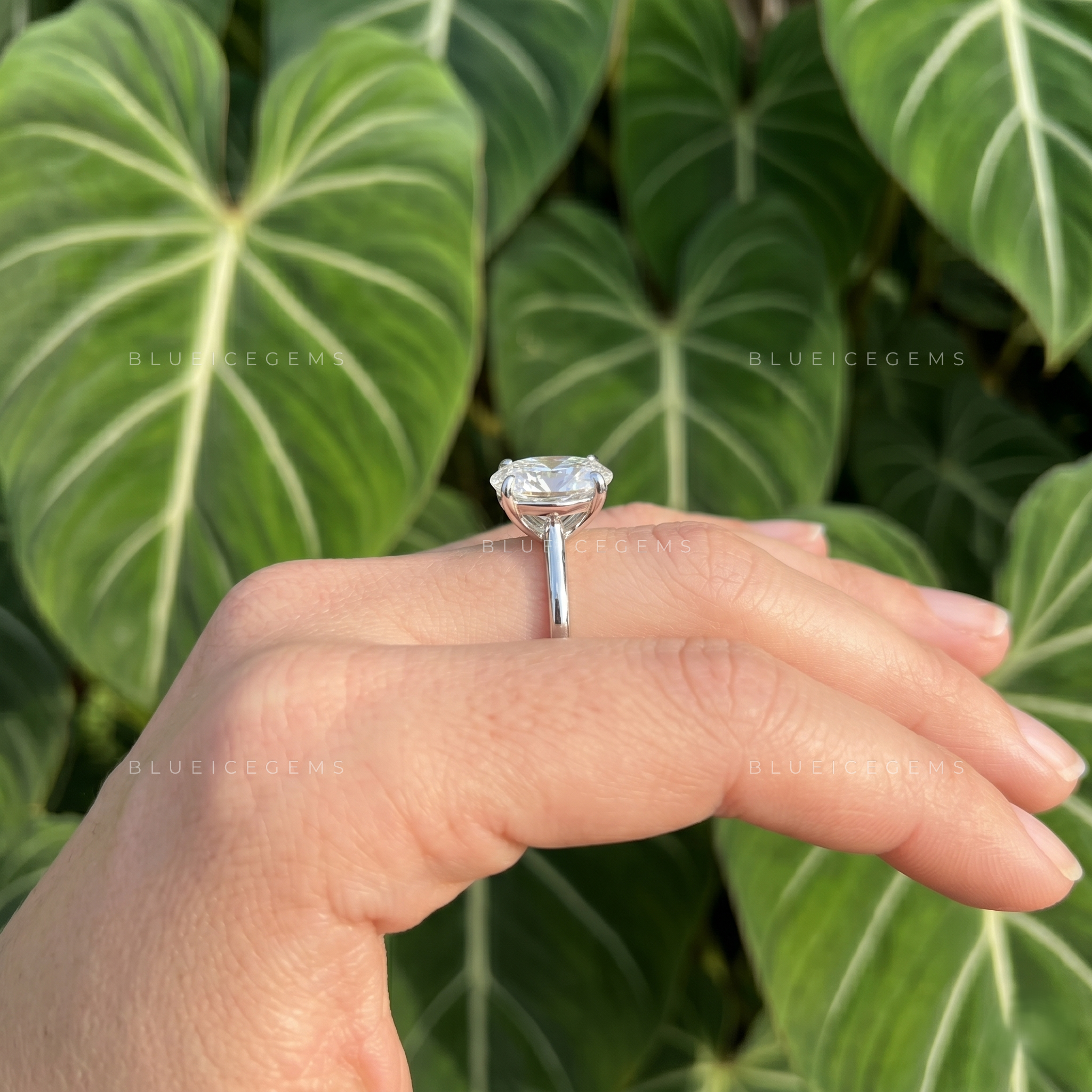 Graceful Oval Brilliant Cut Claw Prong Solitaire Engagement Ring