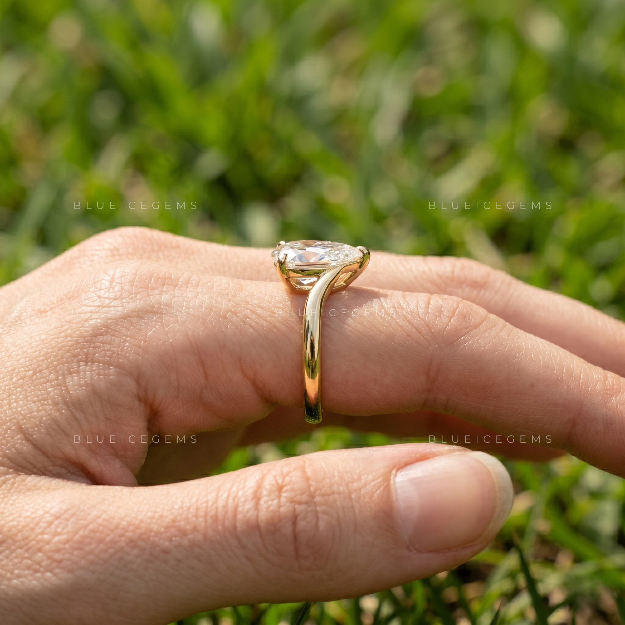 Lunara Tilted Pear Cut East-West Bypass Solitaire Ring