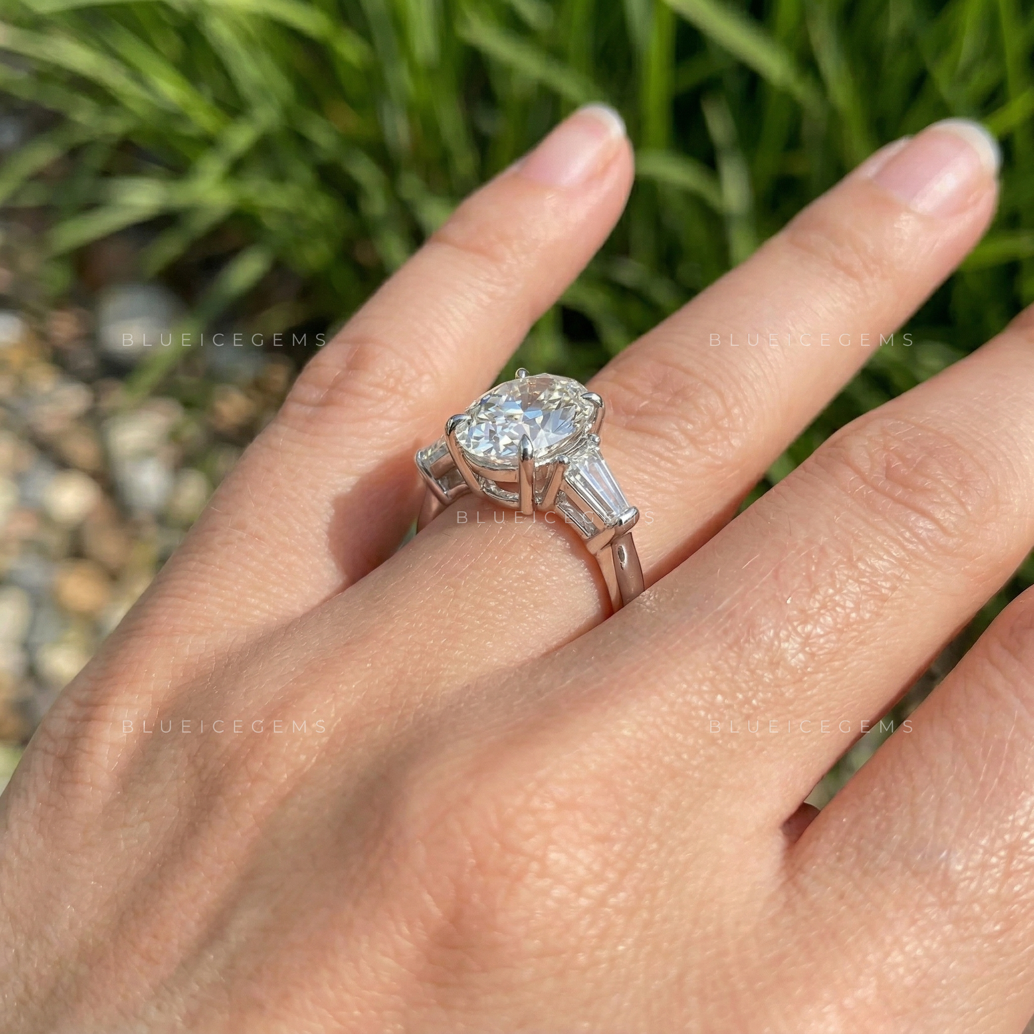 Timeless Elegance Oval and Tapered Baguette Trilogy Engagement Ring