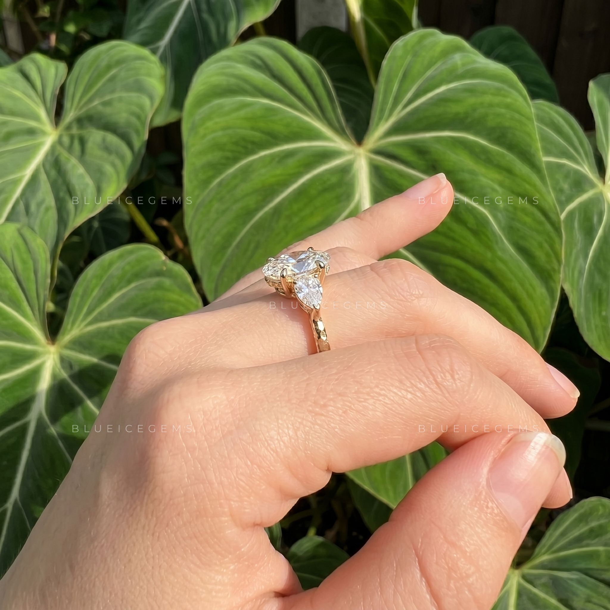 Elegance Unveiled Oval Cut Trilogy Engagement Ring with Pear Accents