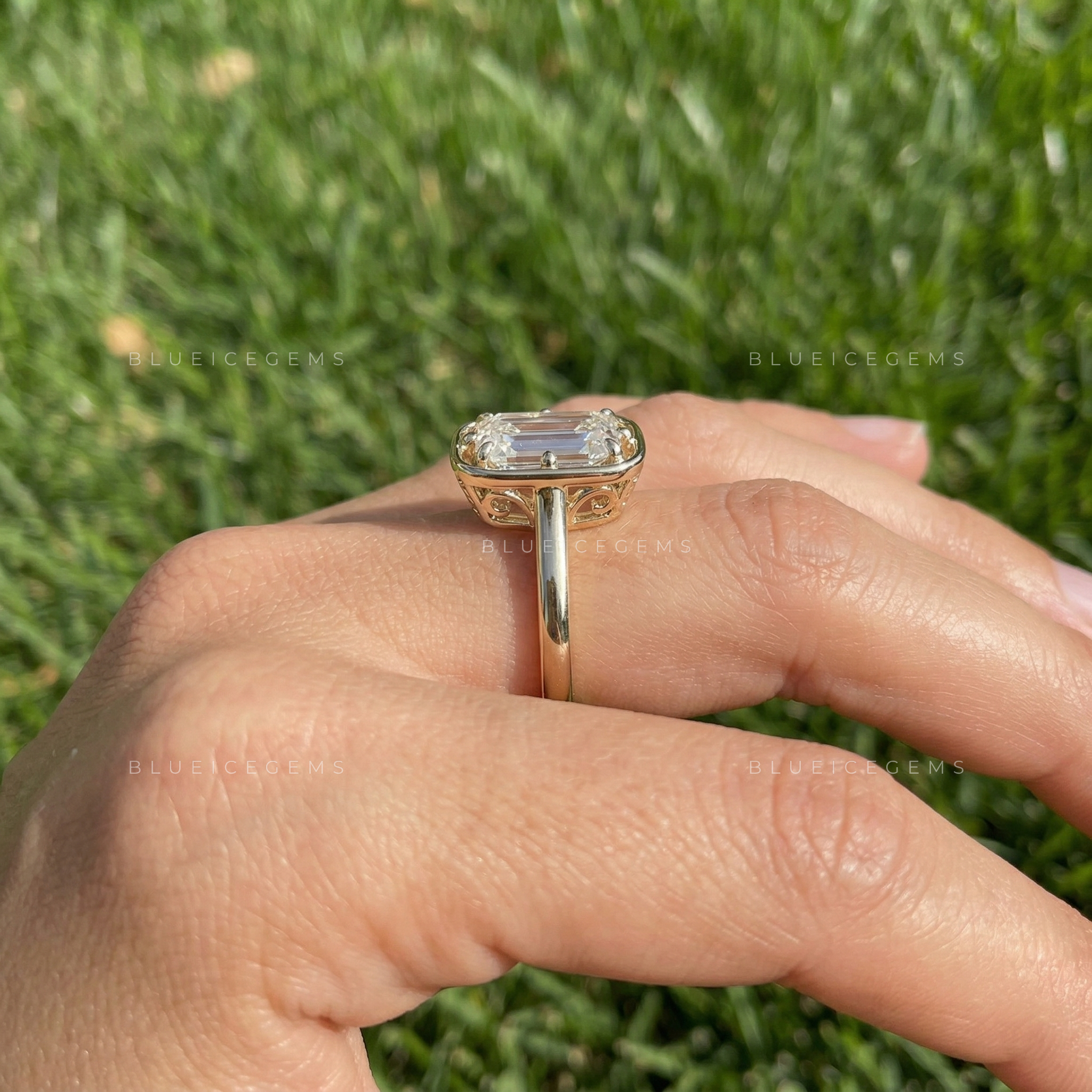 Refined Emerald Cut Solitaire Open Gallery Engagement Ring