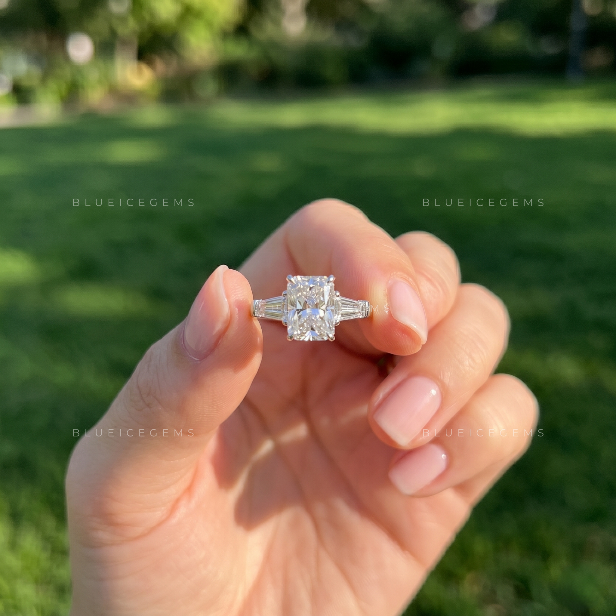 Classic Grace Emerald Cut Three Stone Engagement Ring