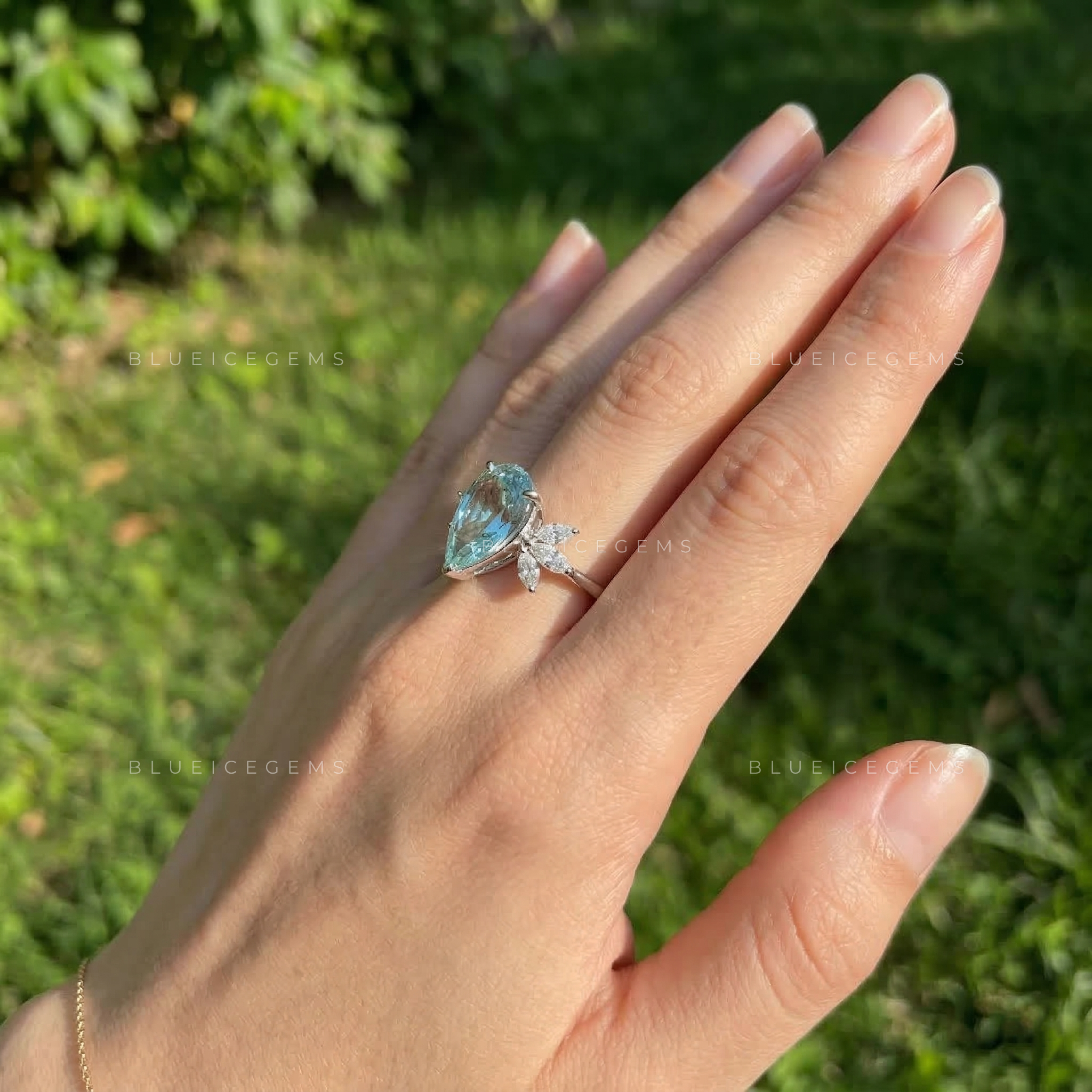 Azure Serenity Pear Cut Marquise Seven Stone Ring