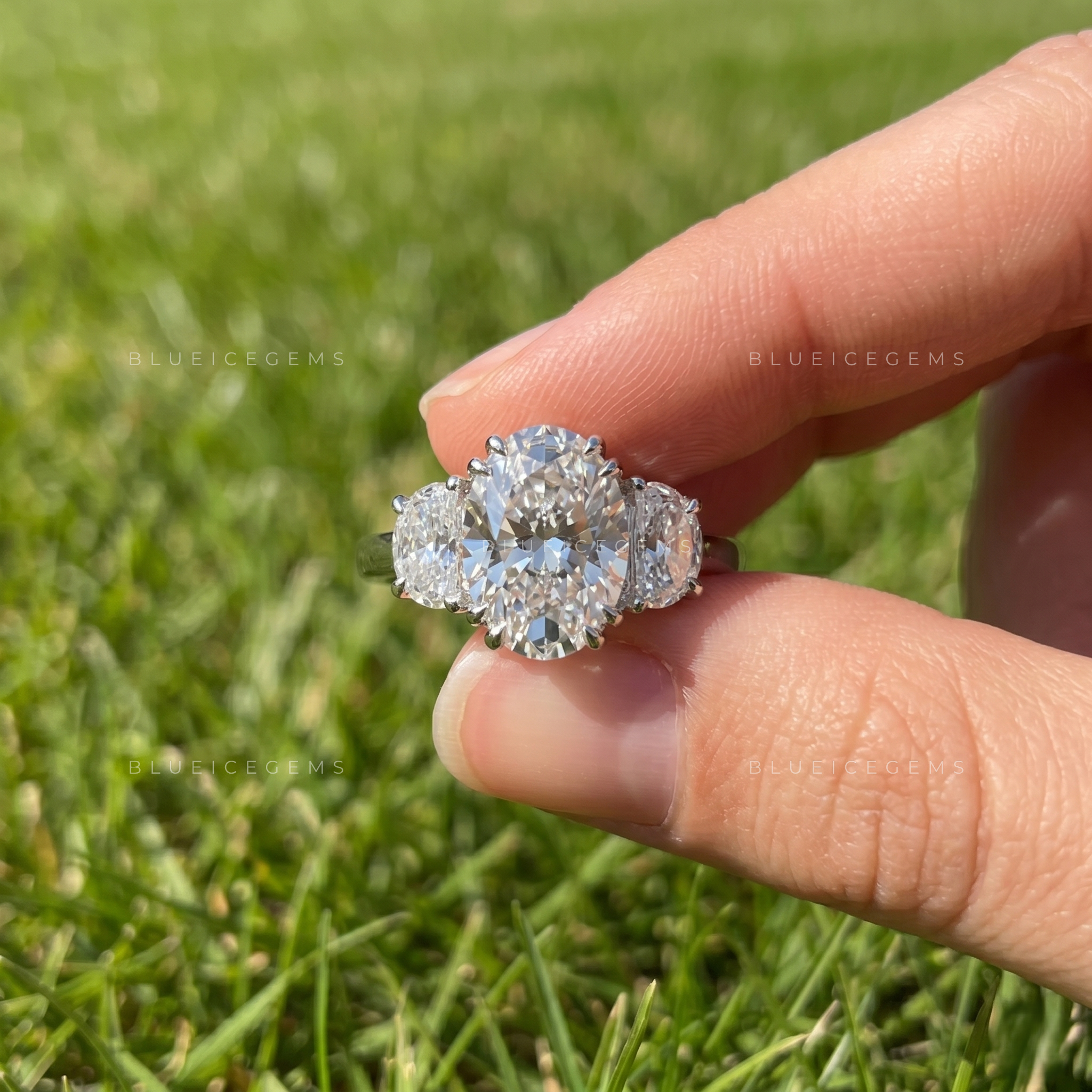 Elegant Symphony Oval Brilliant Cut and Half Moon Three Stone Engagement Ring