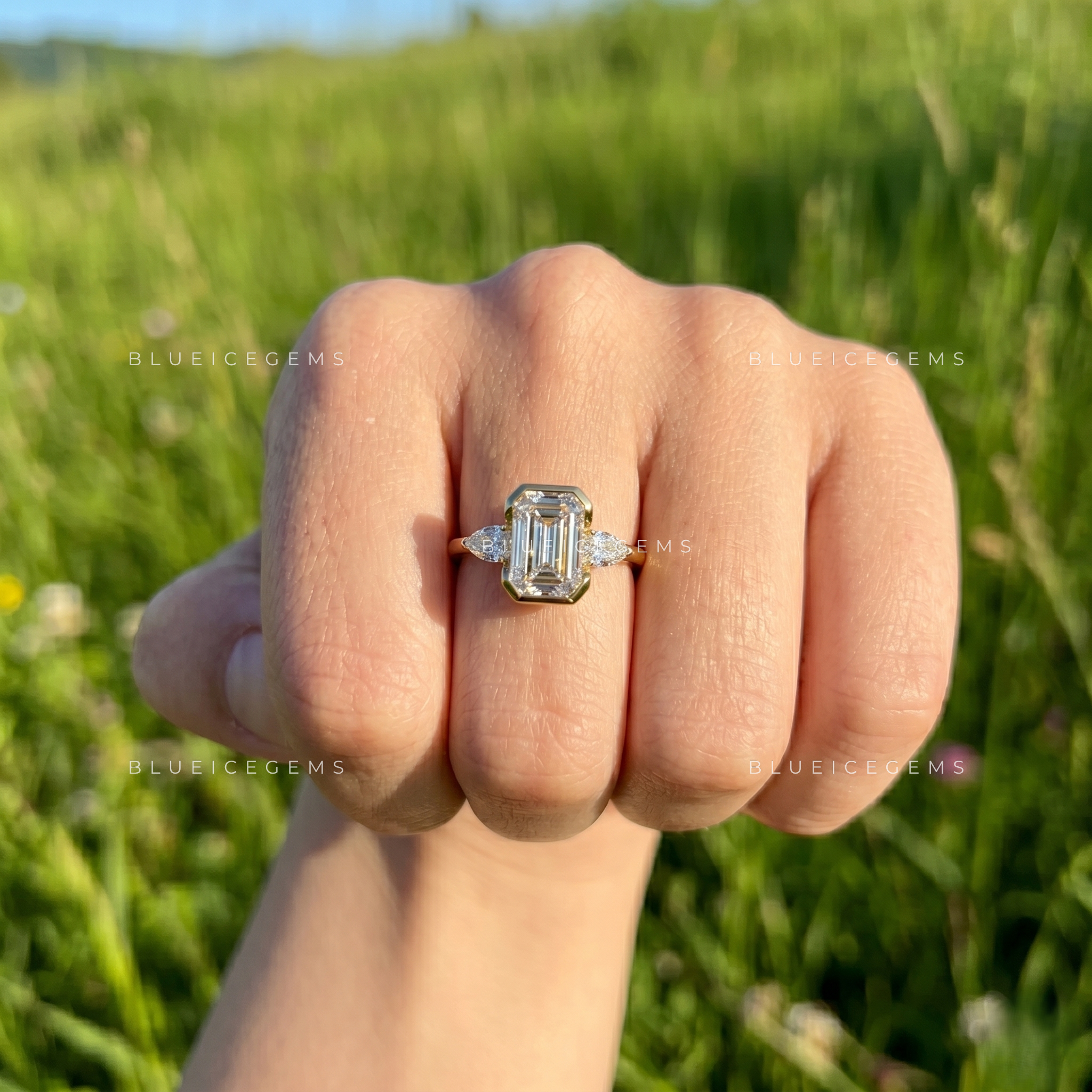 Majestic East-West Emerald Cut Pear Three-Stone Engagement Ring