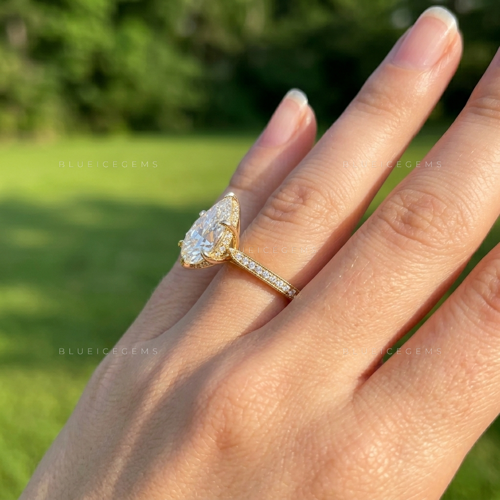 The "Signature Teardrop" Pear & Round Halo: Bold Elegance