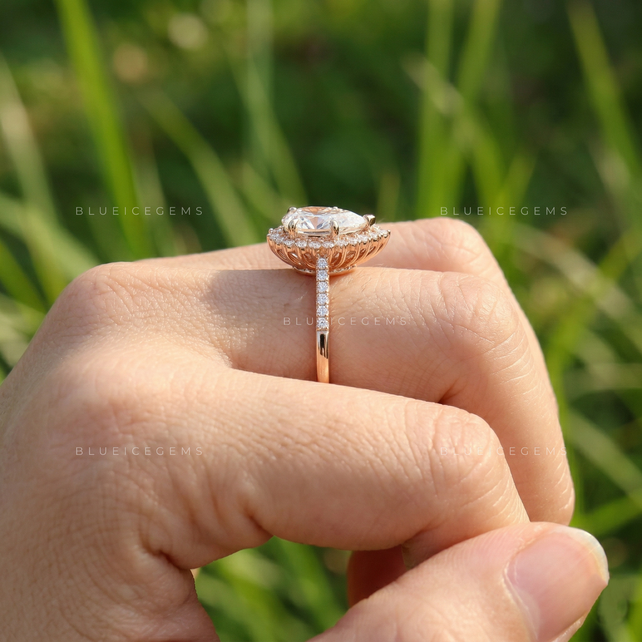 Graceful Pear Cut Halo Side Stone Engagement Ring