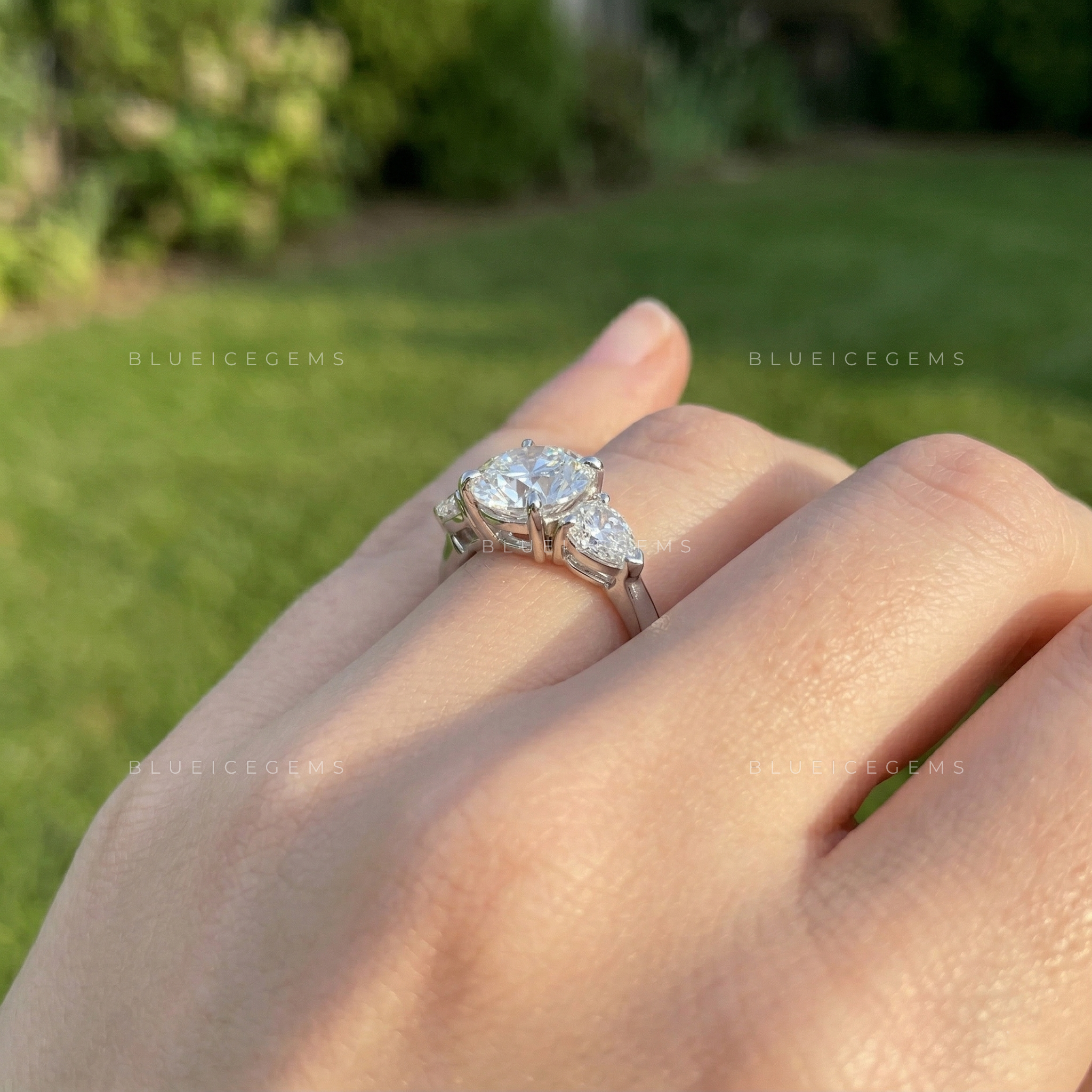 Celestial Brilliance Round and Pear Cut Trilogy Ring