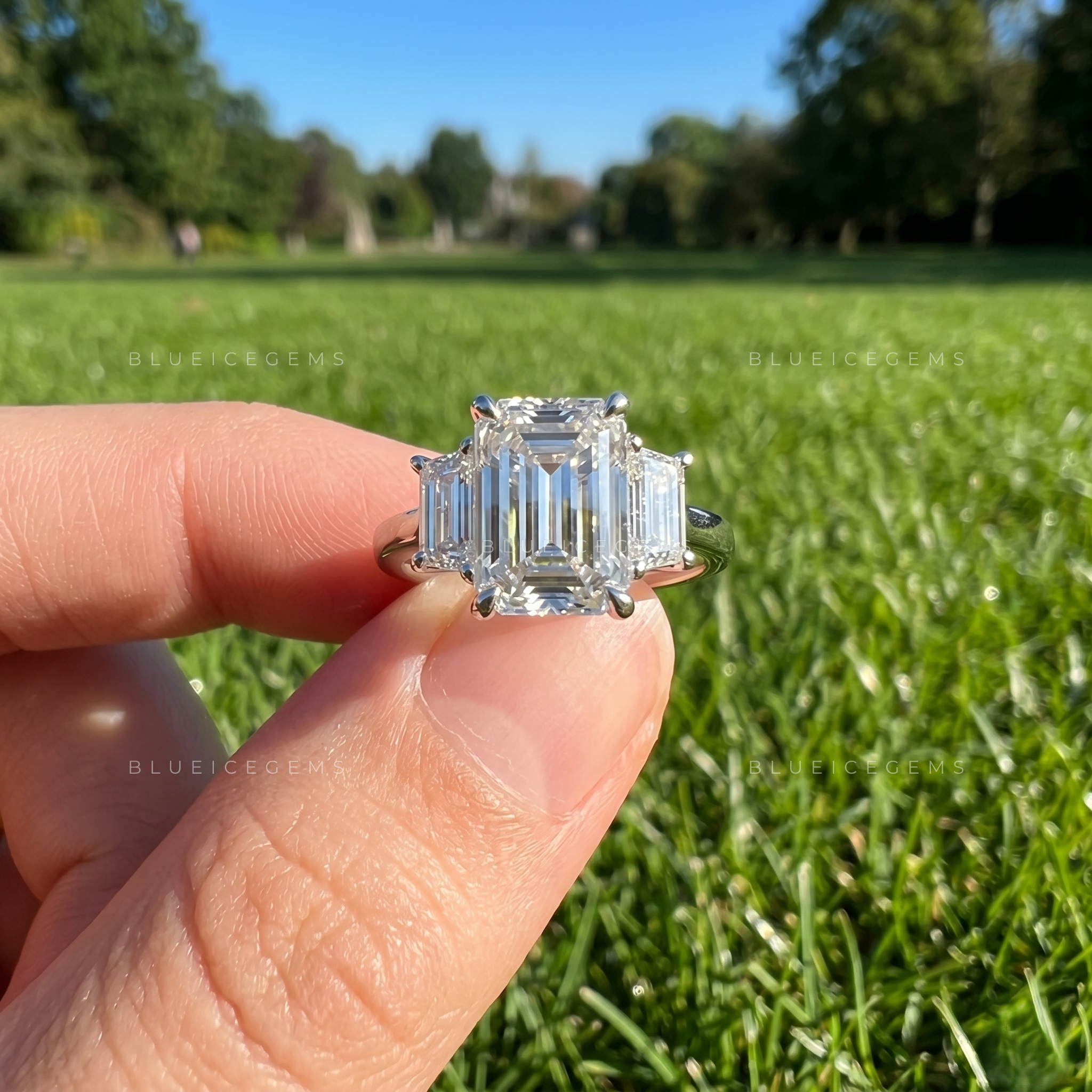 Majestic Symmetry Emerald Cut Three-Stone Engagement Ring