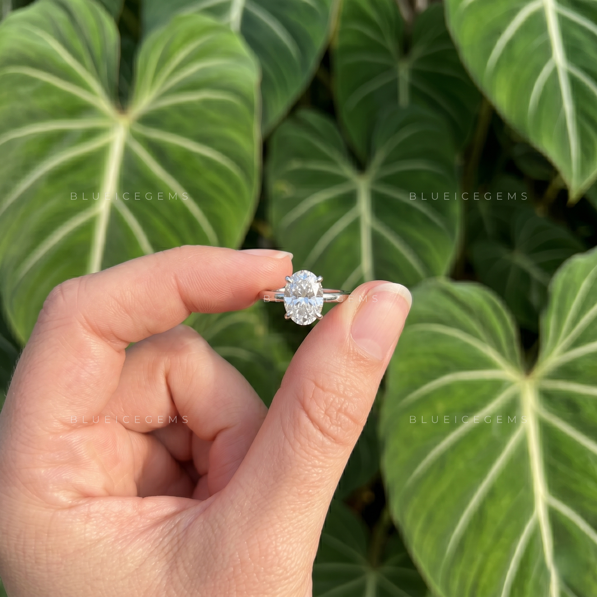 Graceful Oval Brilliant Cut Claw Prong Solitaire Engagement Ring