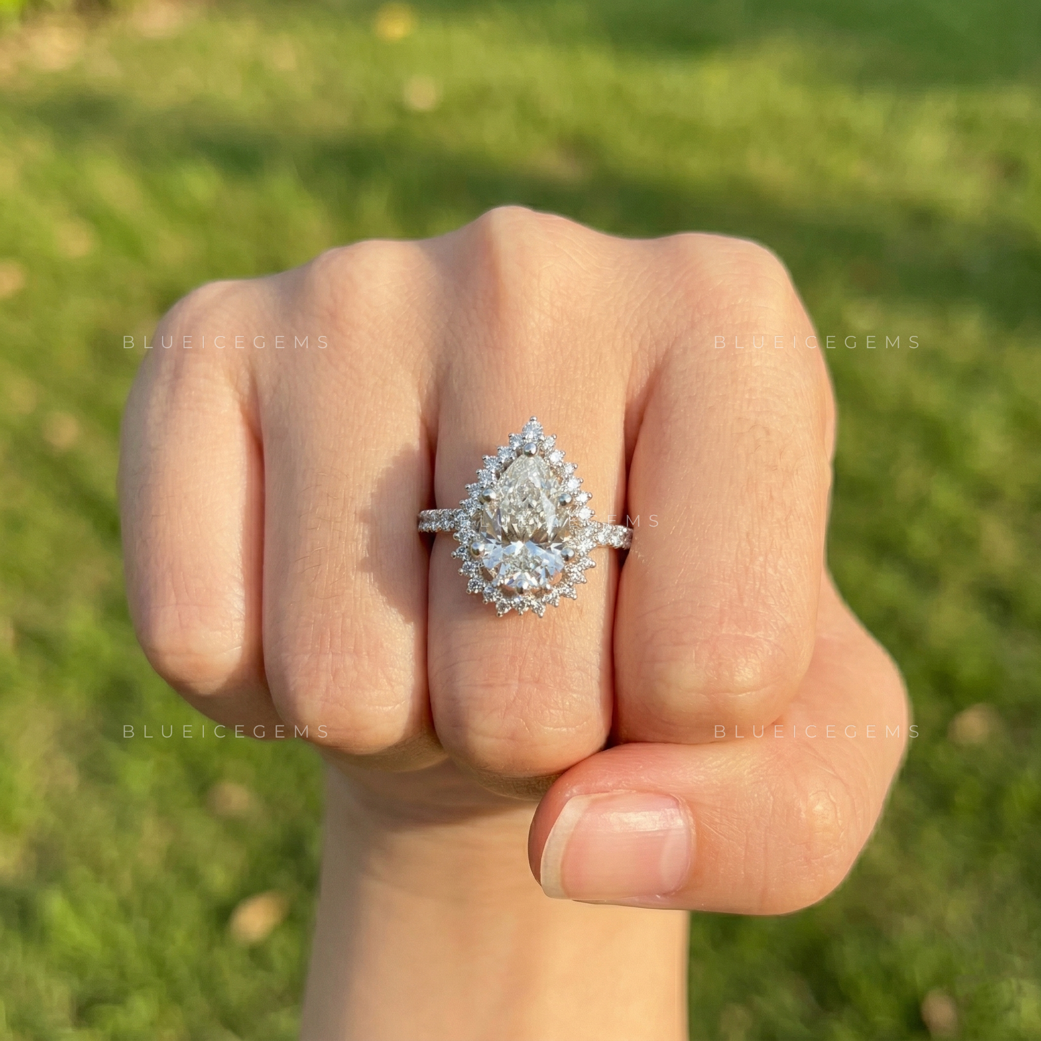 Elegant Radiance Pear Cut Pavé Engagement Ring