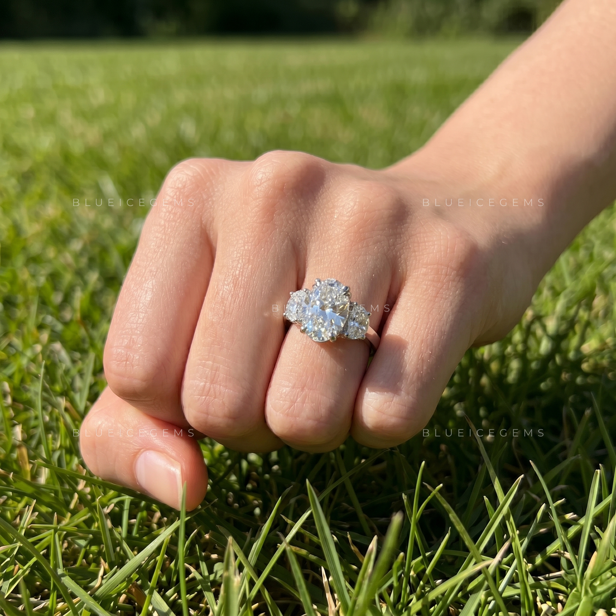 Elegant Symphony Oval Brilliant Cut and Half Moon Three Stone Engagement Ring
