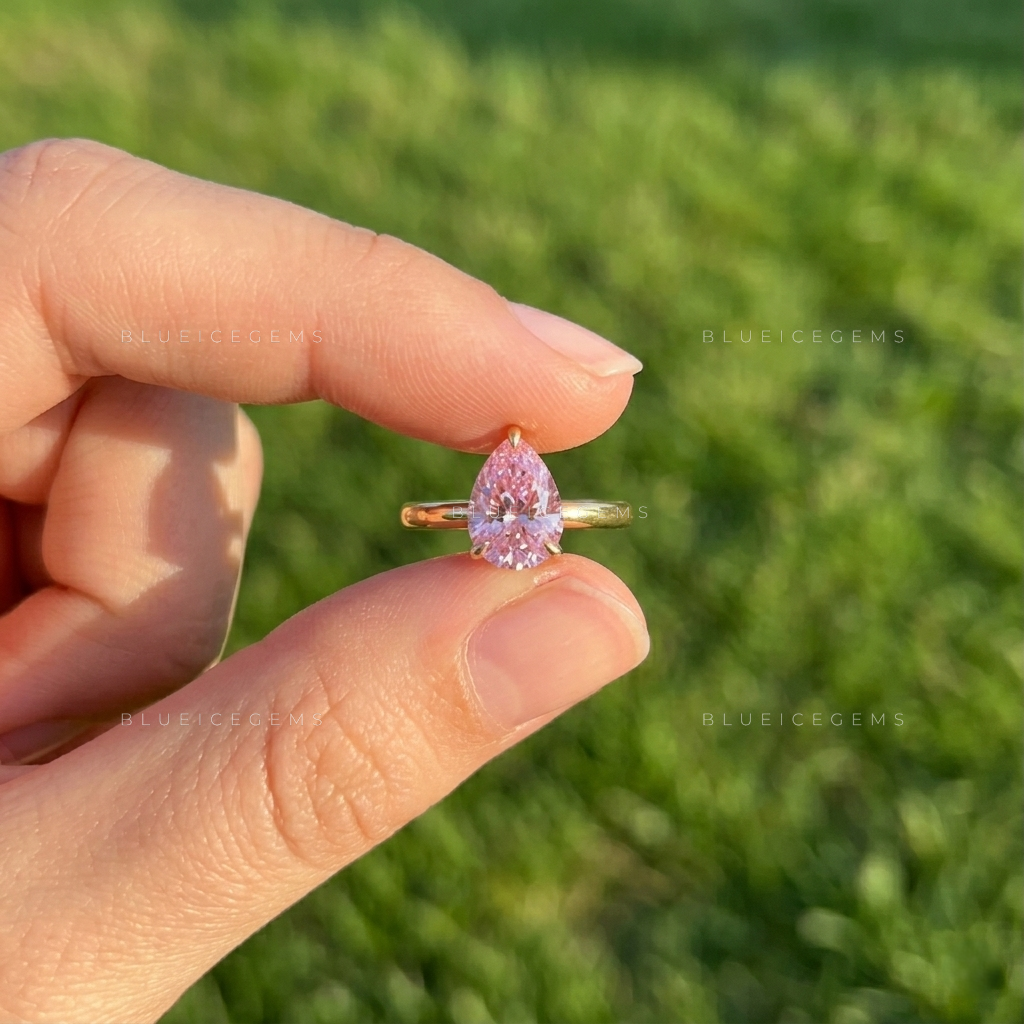 The "Blush Radiance" Pear Solitaire: A Dreamy Pink Statement