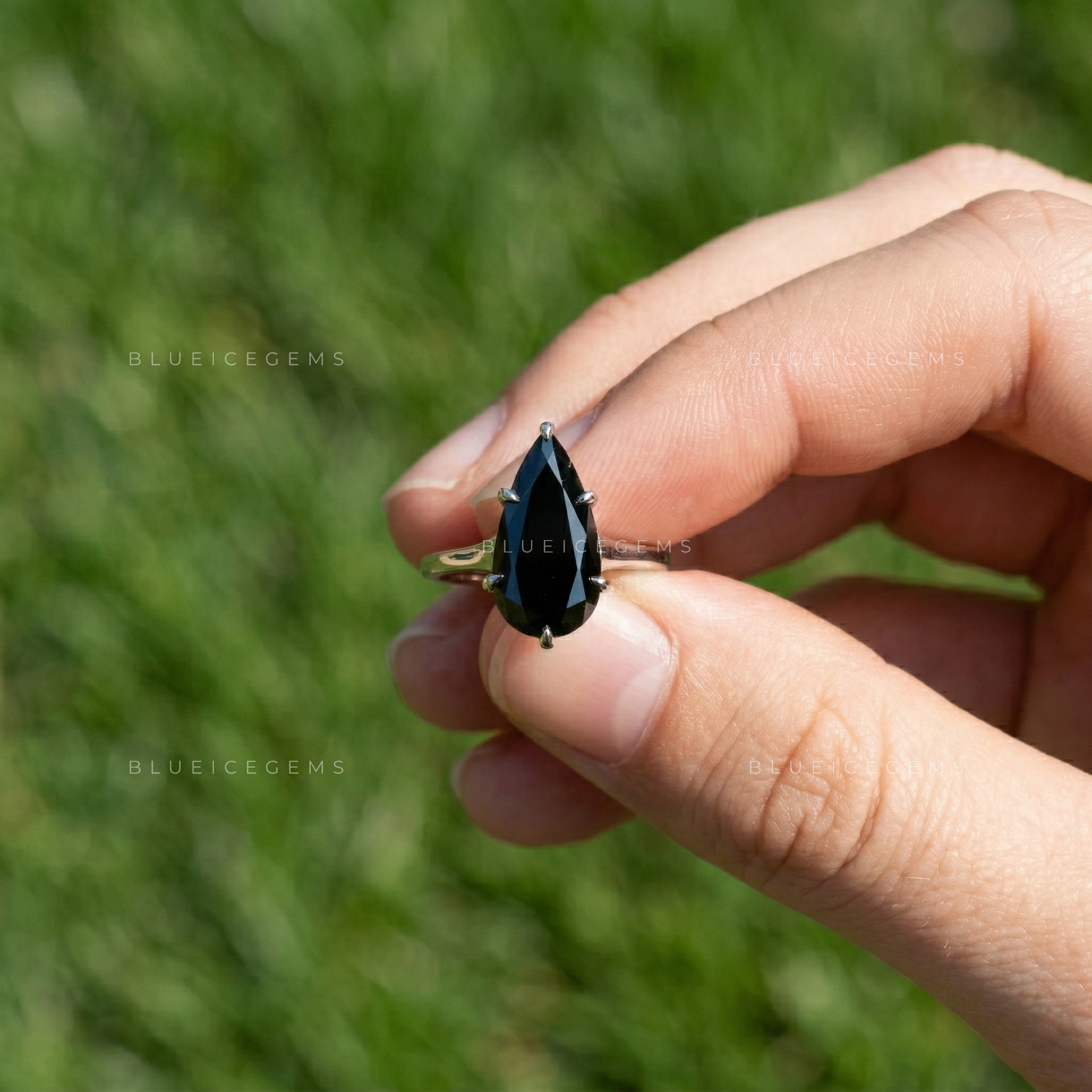 Midnight Noir Pear Cut Moissanite Solitaire Ring