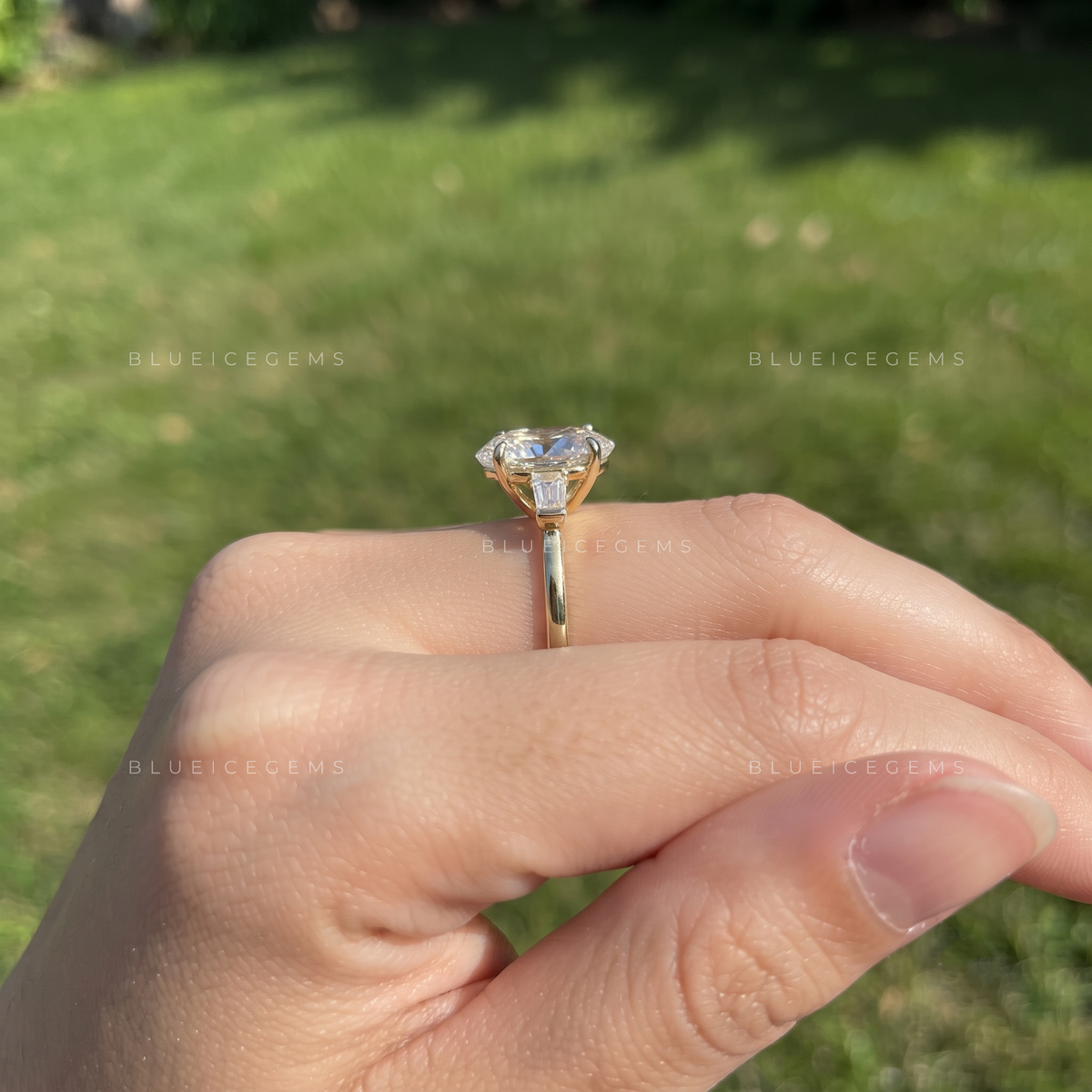 Moval Grace Three-Stone Tapered Baguette Engagement Ring