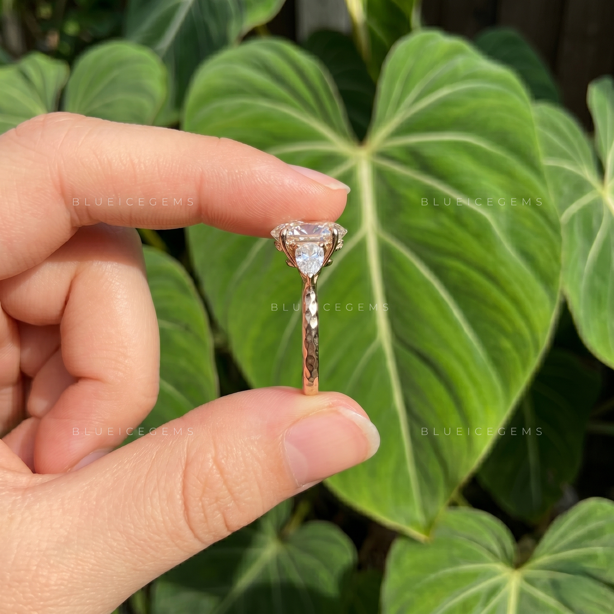 Elegance Unveiled Oval Cut Trilogy Engagement Ring with Pear Accents