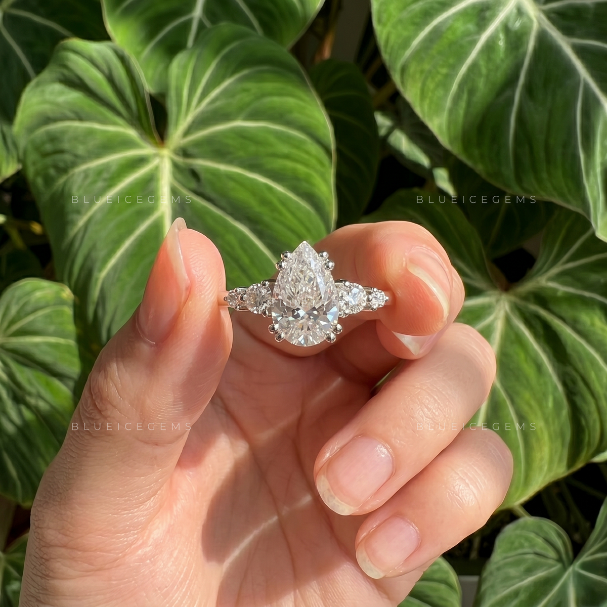 Luminous Majesty Pear Cut Five Stone Double Prong Engagement Ring