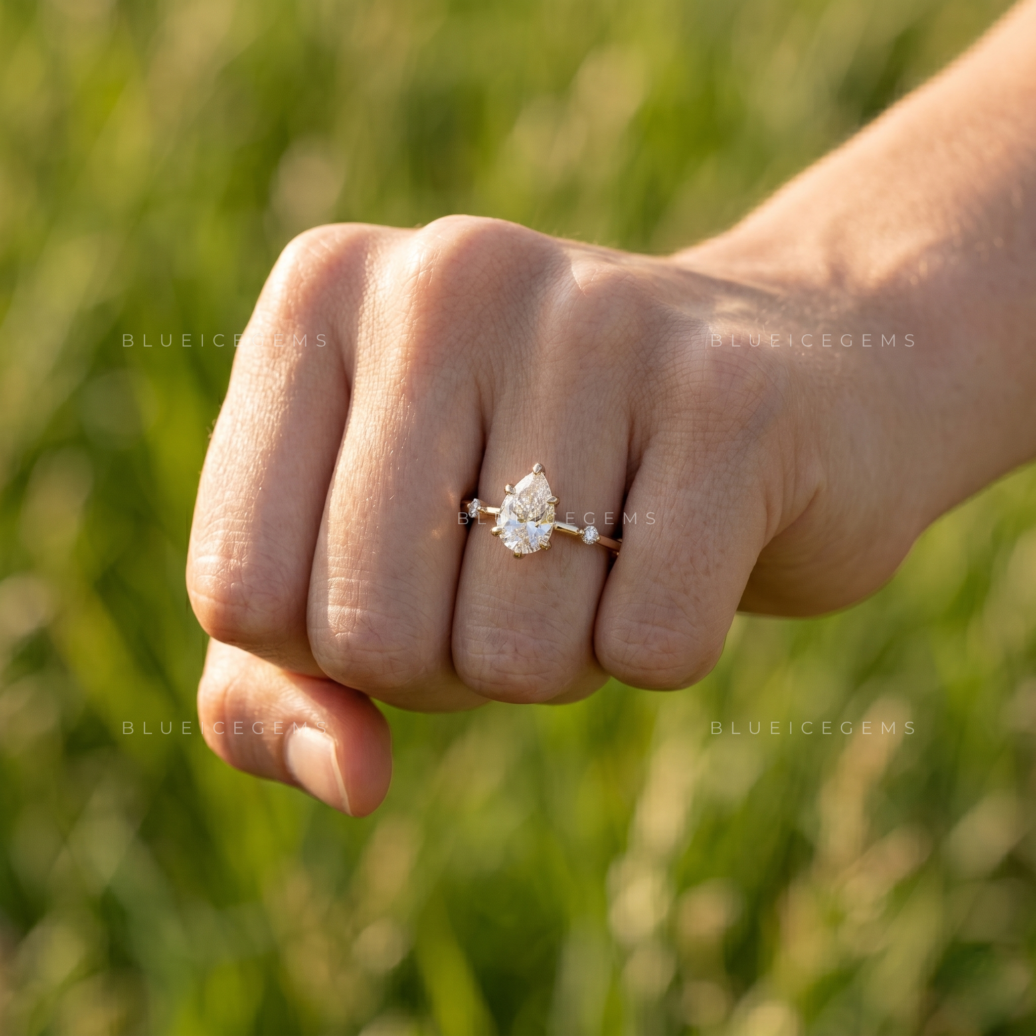 Elegant Grace Pear Cut Five Stone Accent Engagement Ring