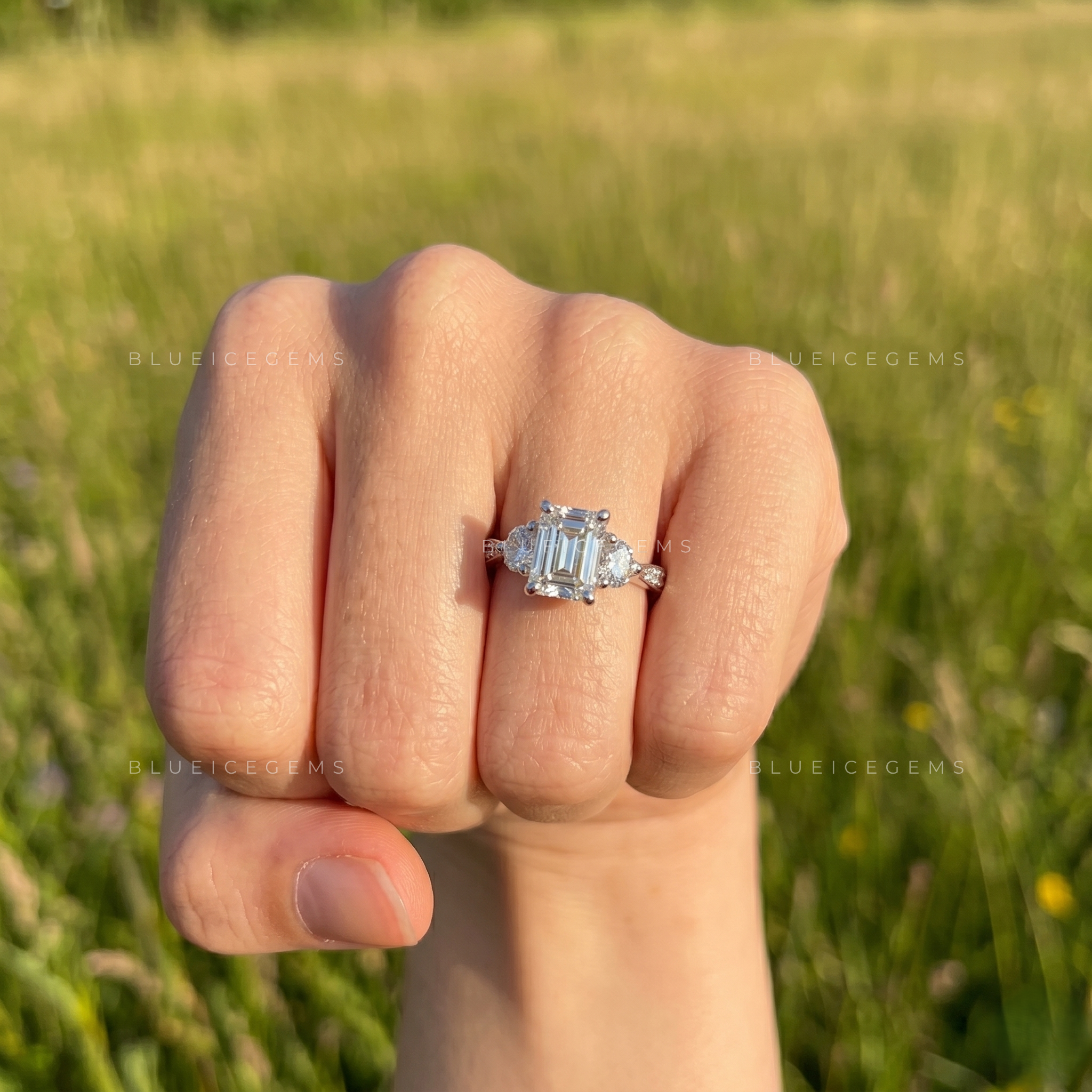 Sophisticated Elegance Elongated Emerald Cut Solitaire with Tapered Accent Band Anniversary Ring