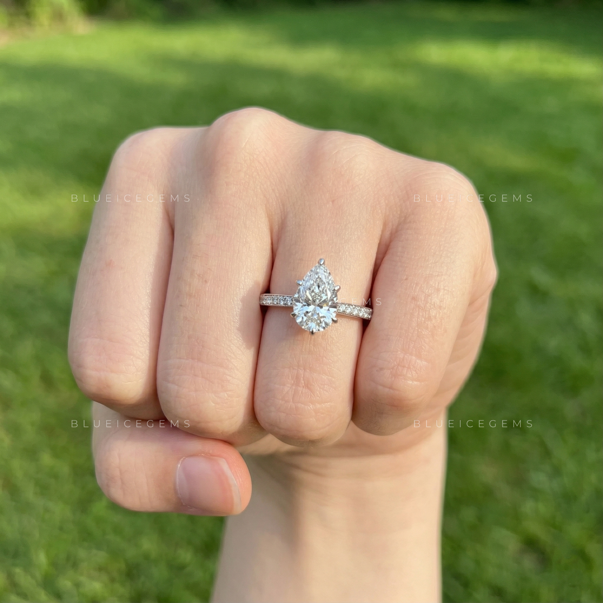 Graceful Radiance Pear Cut Hidden Accent Engagement Ring