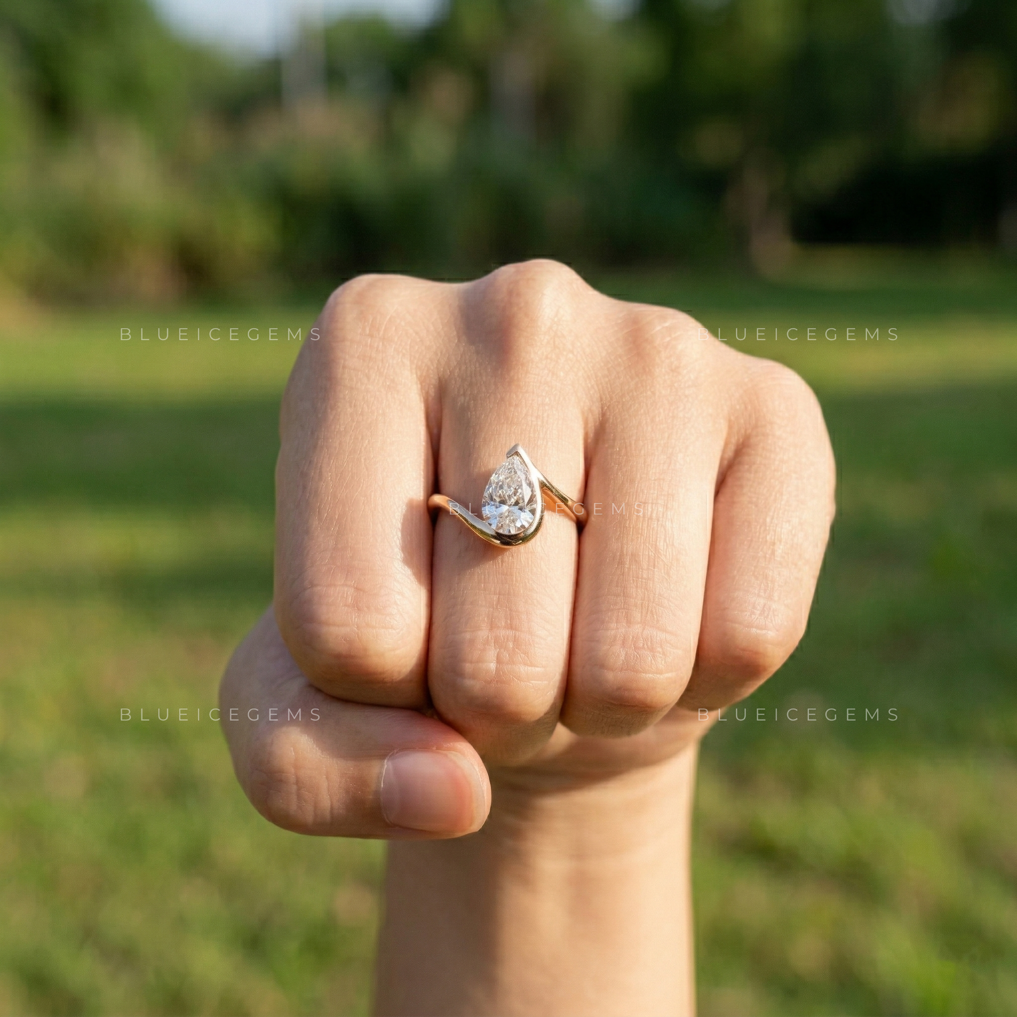 The "Signature Silhouette" Pear Cut Bezel Solitaire: Modern Icon