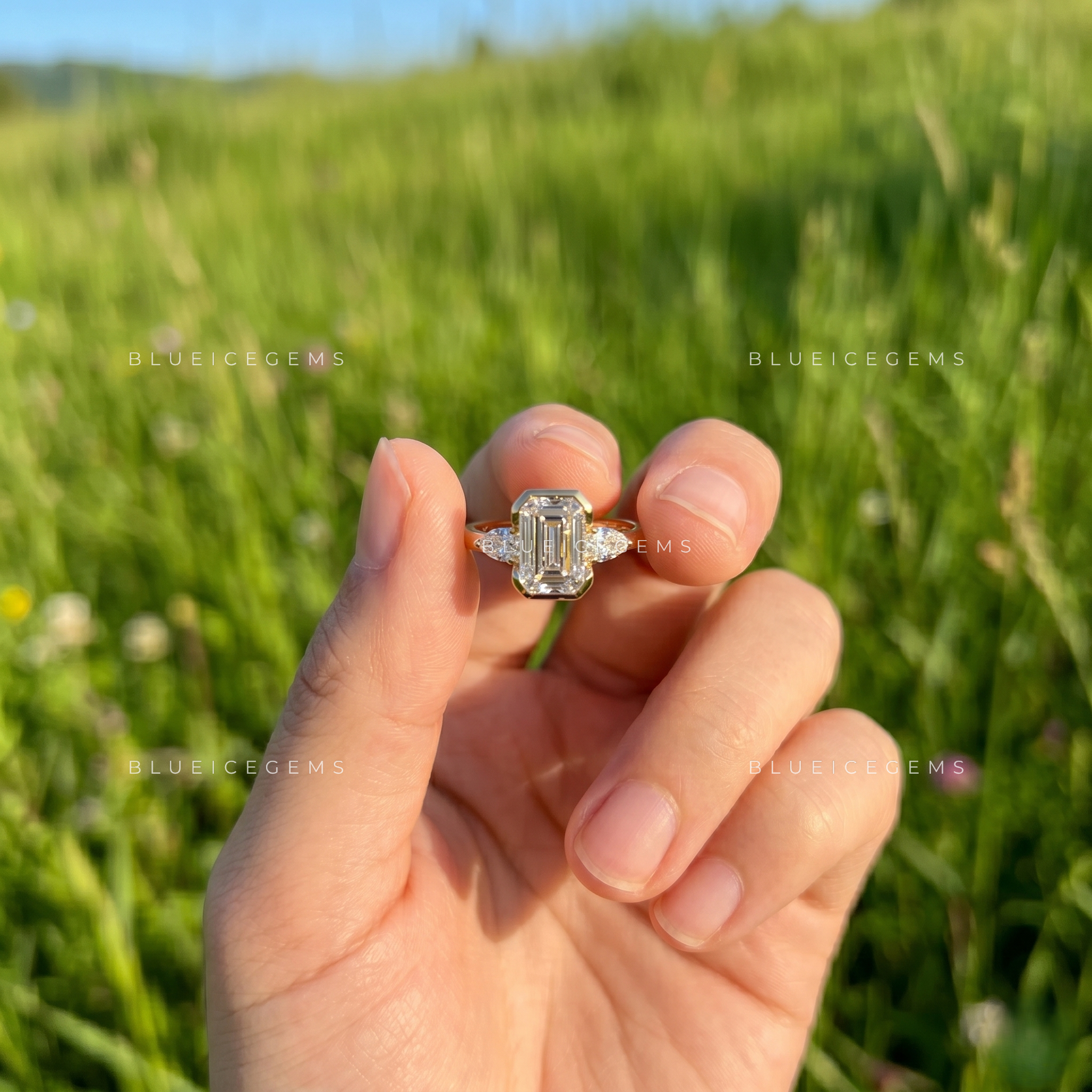 Majestic East-West Emerald Cut Pear Three-Stone Engagement Ring