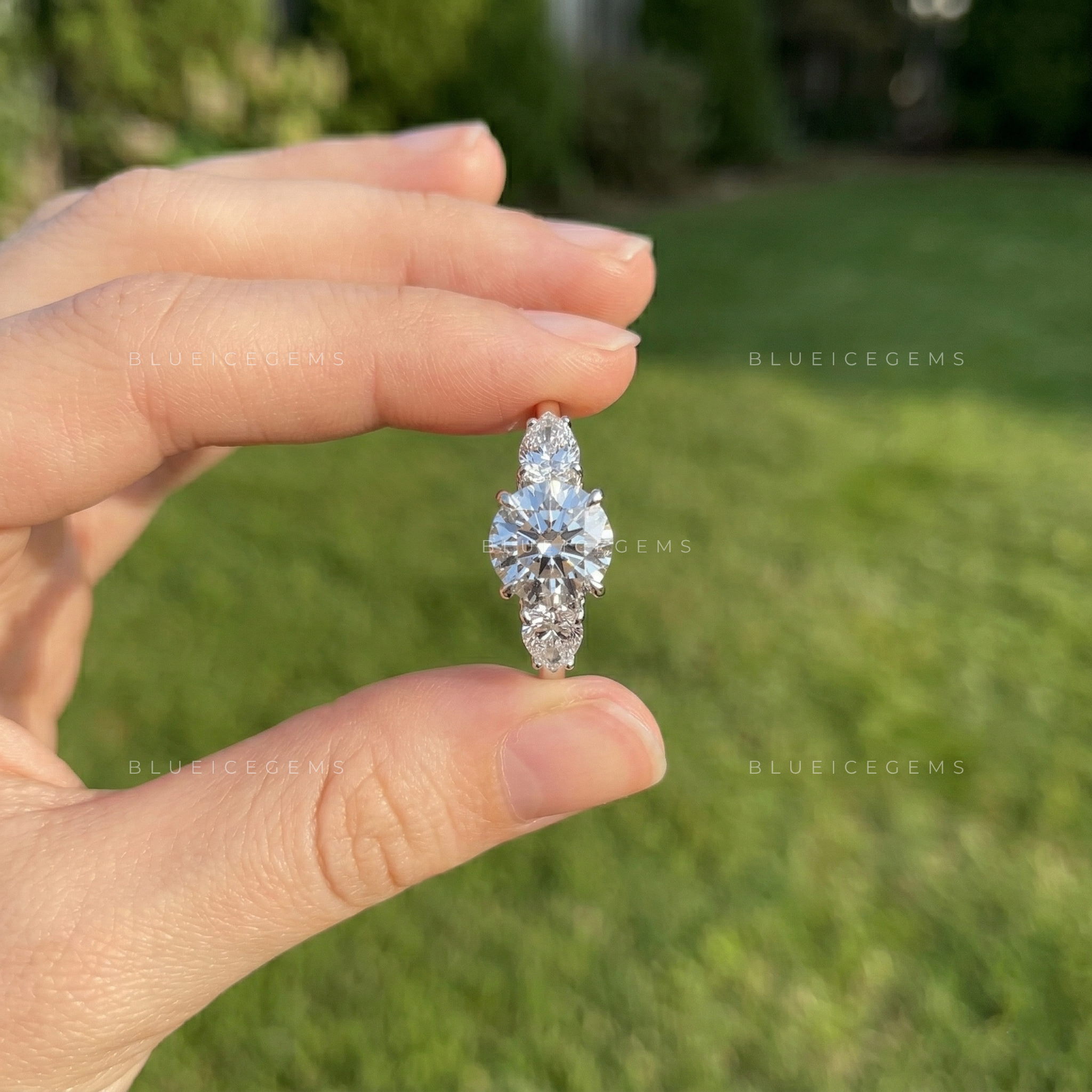 Celestial Brilliance Round and Pear Cut Trilogy Ring