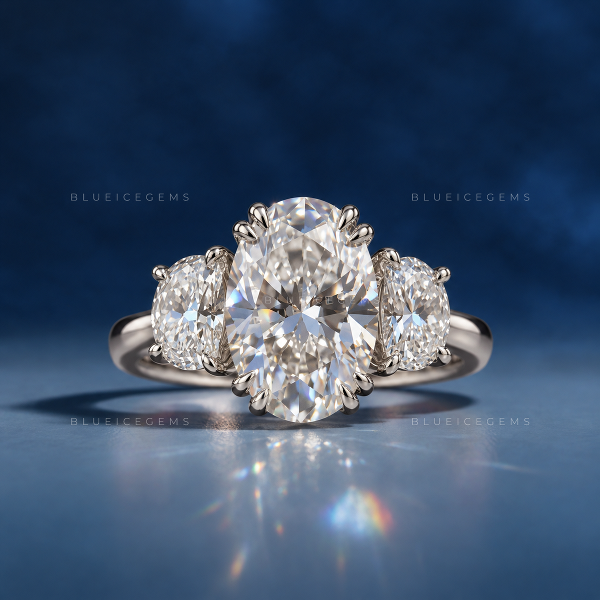 Elegant Symphony Oval Brilliant Cut and Half Moon Three Stone Engagement Ring