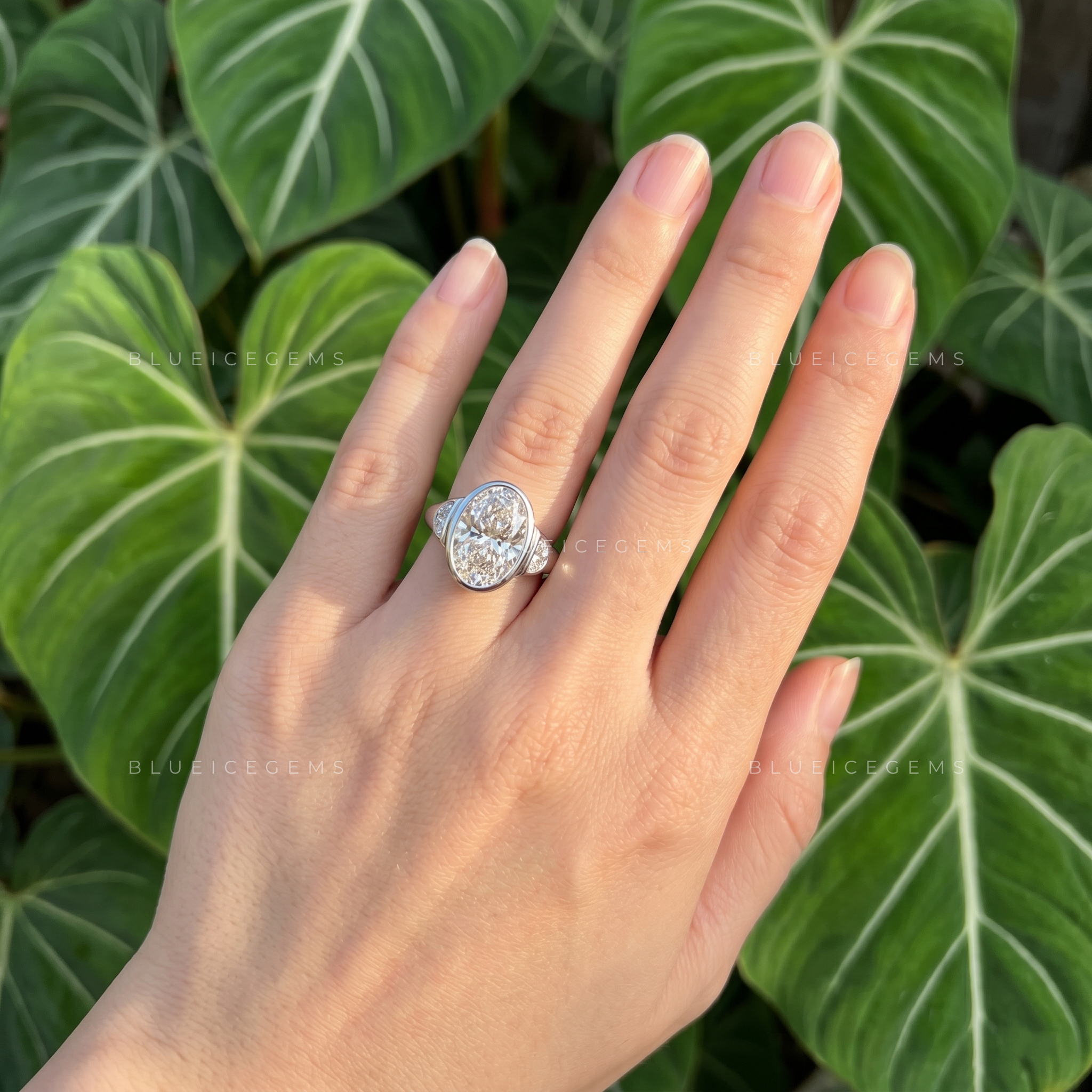 Majestic Harmony Oval Cut Bezel Three Stone Half Moon Engagement Ring
