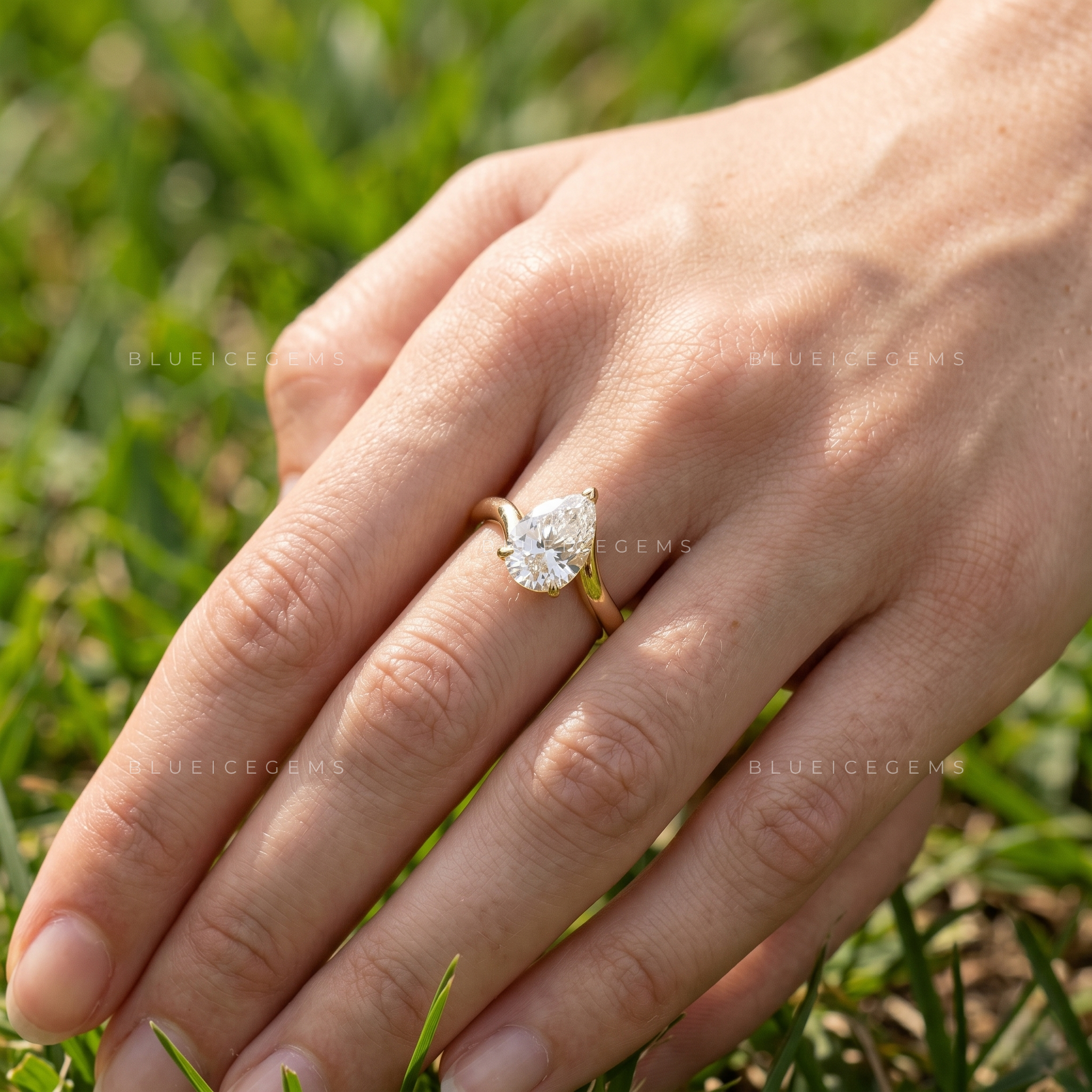 Lunara Tilted Pear Cut East-West Bypass Solitaire Ring