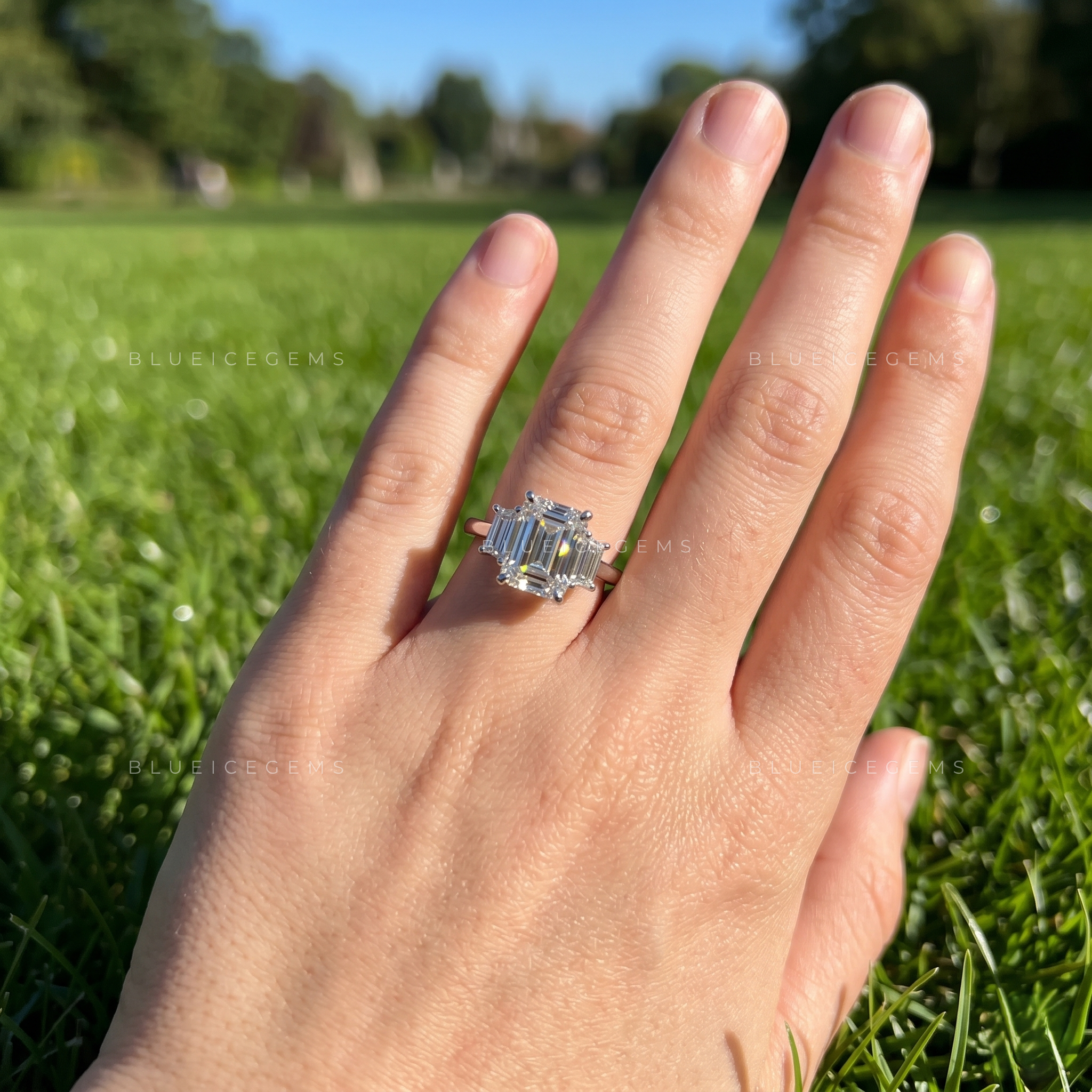 Majestic Symmetry Emerald Cut Three-Stone Engagement Ring