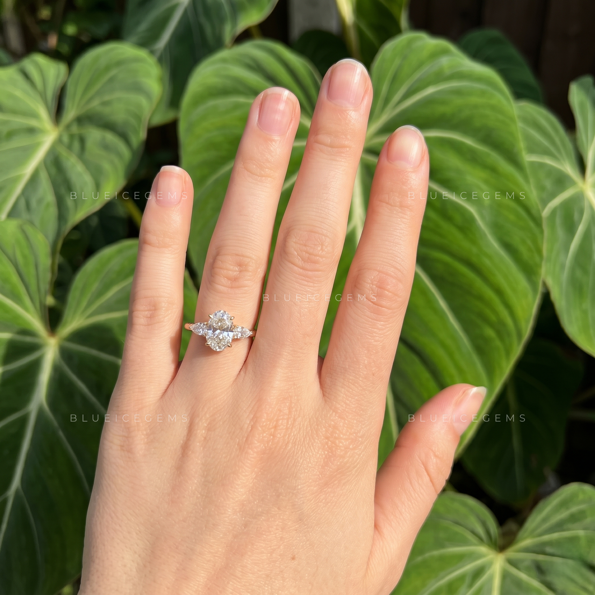 Elegance Unveiled Oval Cut Trilogy Engagement Ring with Pear Accents