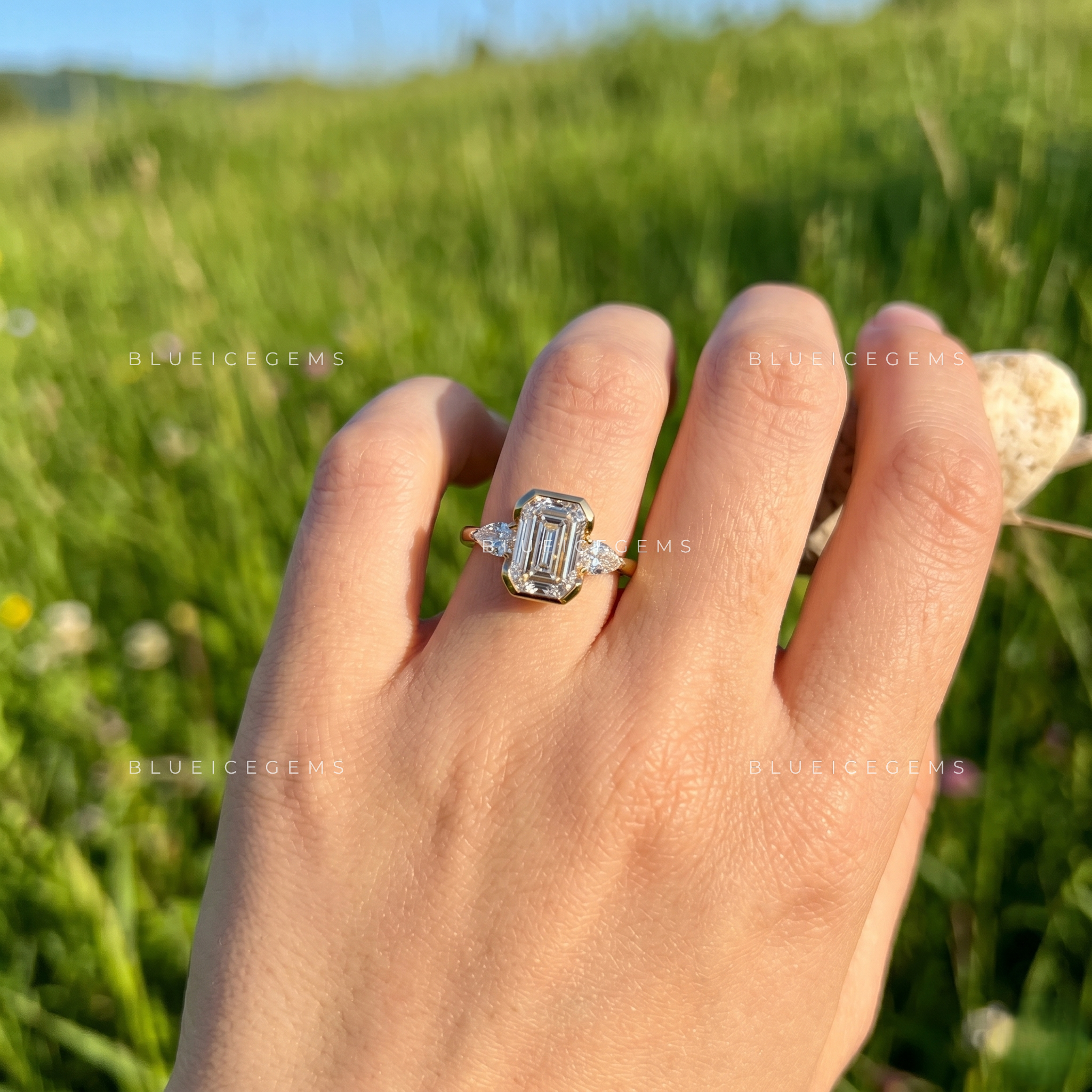 Majestic East-West Emerald Cut Pear Three-Stone Engagement Ring