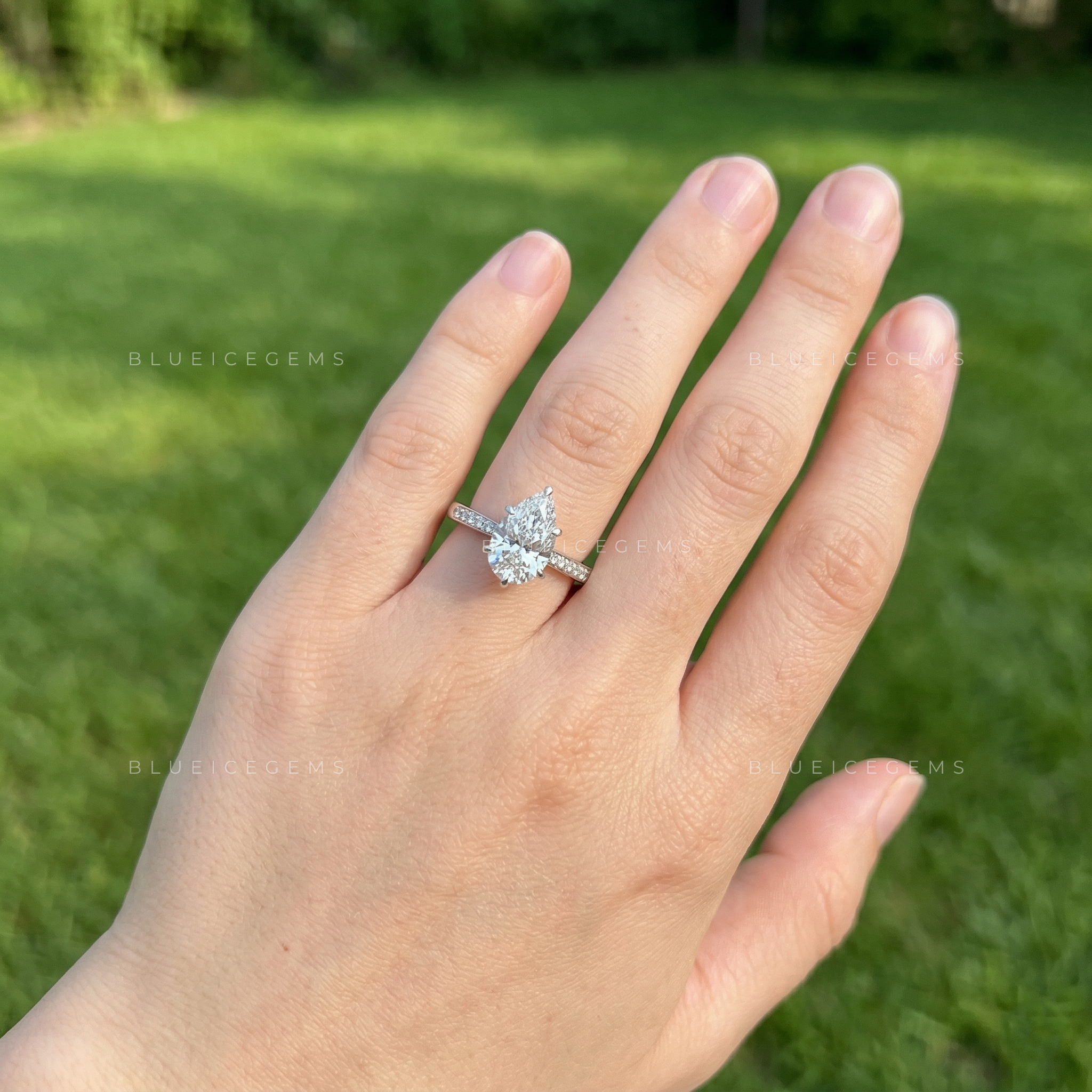 Graceful Radiance Pear Cut Hidden Accent Engagement Ring