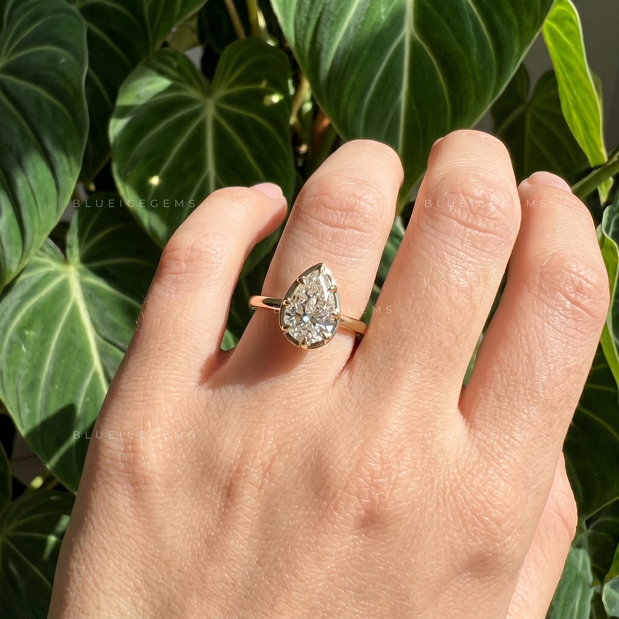 Modern Grace Pear Cut 8-Prong Bezel Solitaire Engagement Ring
