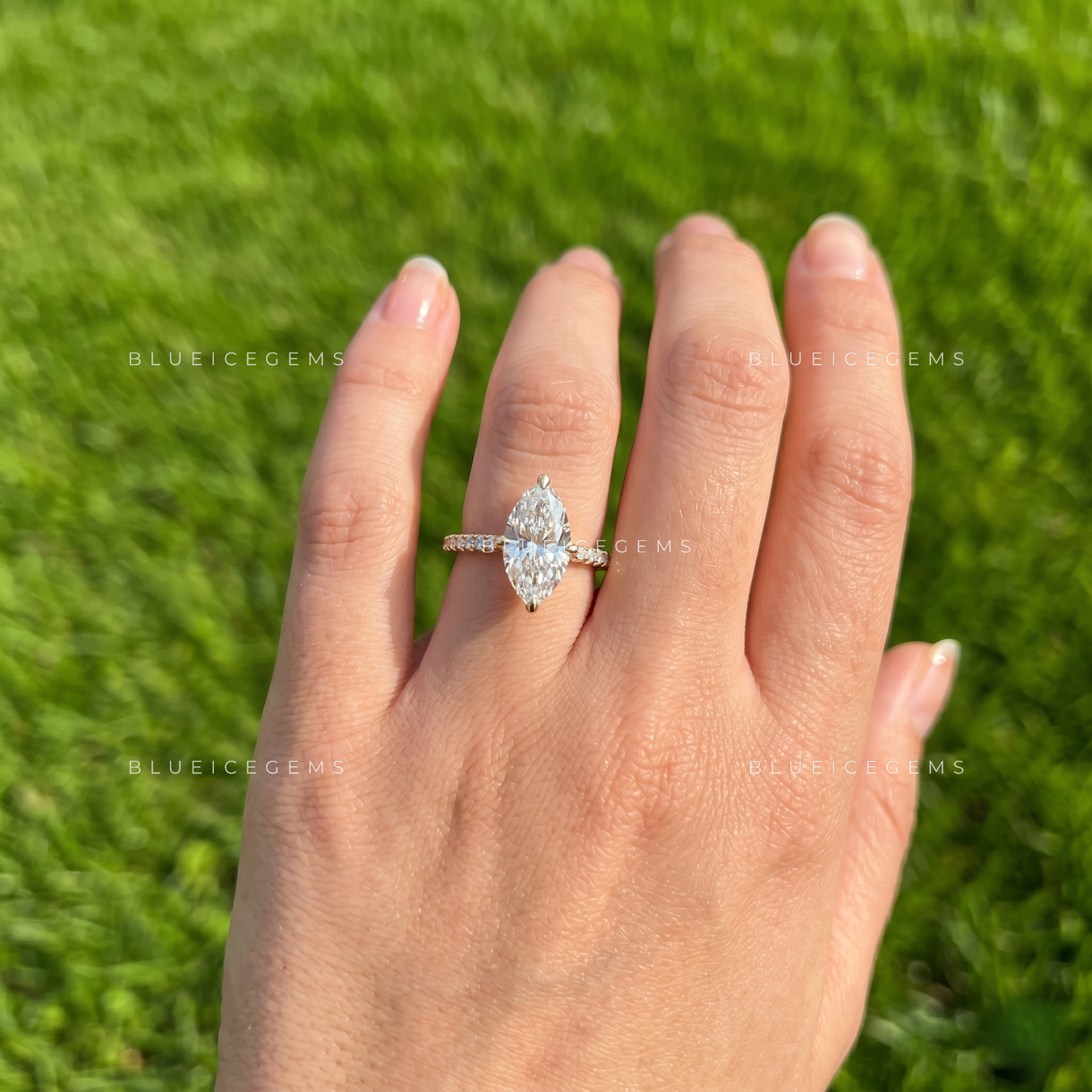 East-West Marquise Cut Cathedral Hidden Halo Engagement Ring