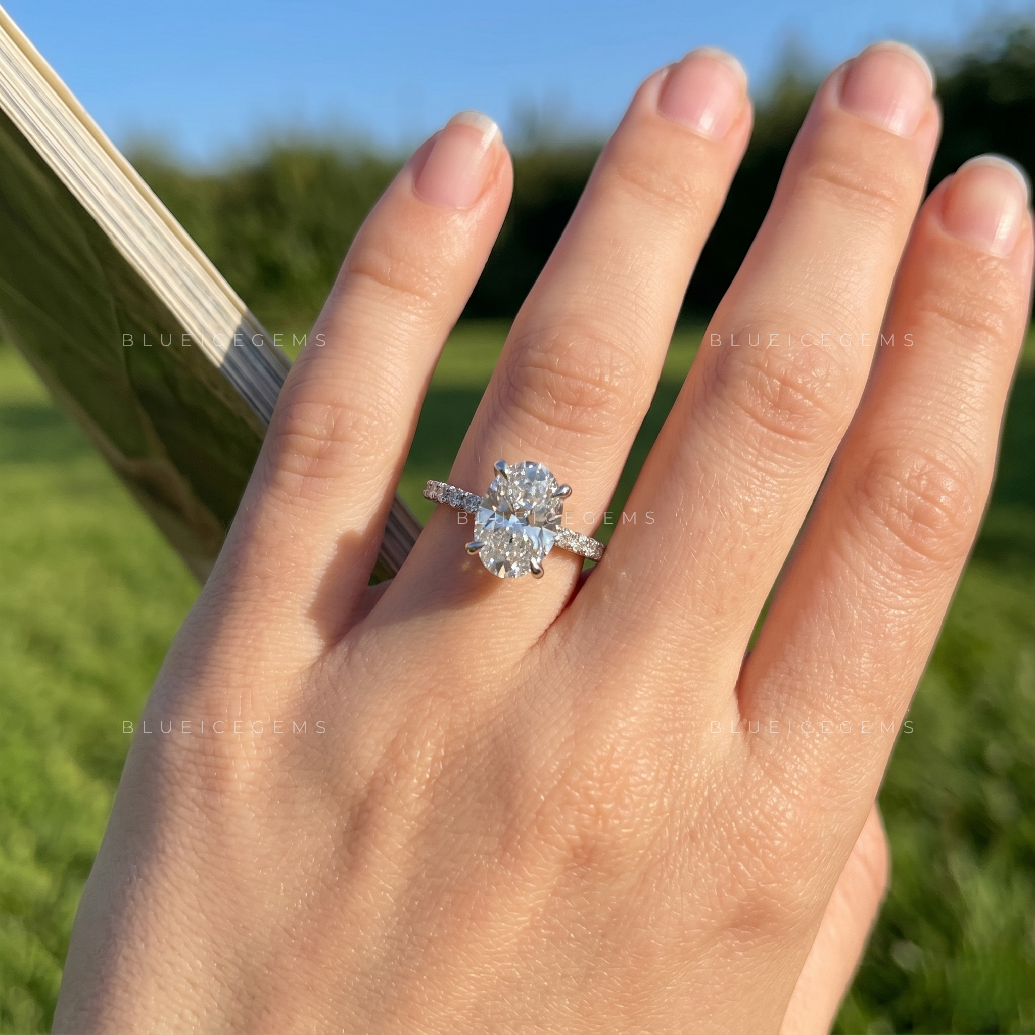 Radiant Oval Brilliant Cut Solitaire Ring with Sparkling Pave Accents