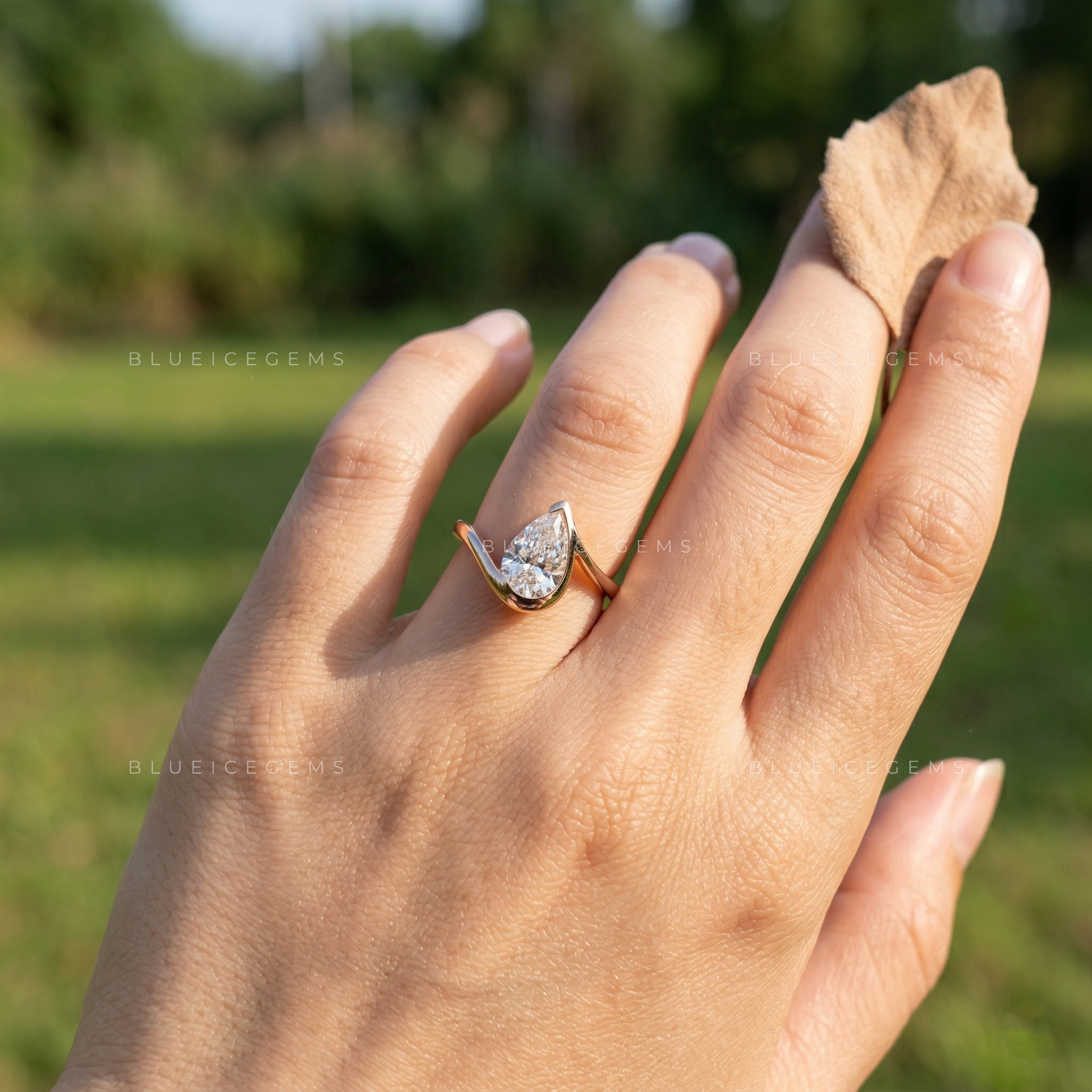 The "Signature Silhouette" Pear Cut Bezel Solitaire: Modern Icon