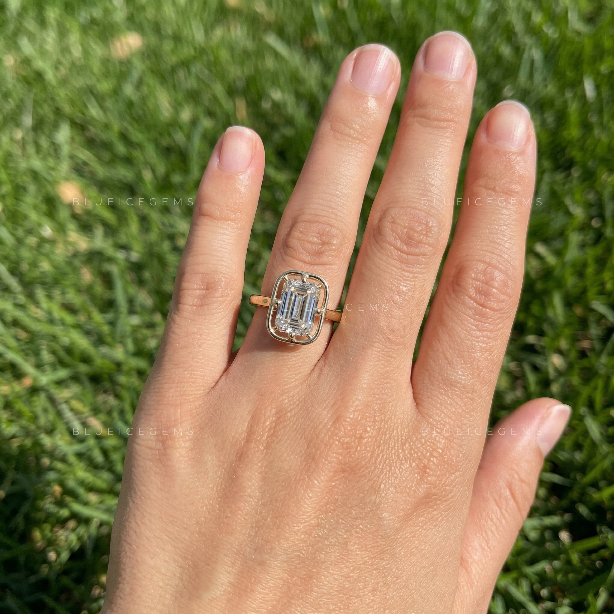 Refined Emerald Cut Solitaire Open Gallery Engagement Ring