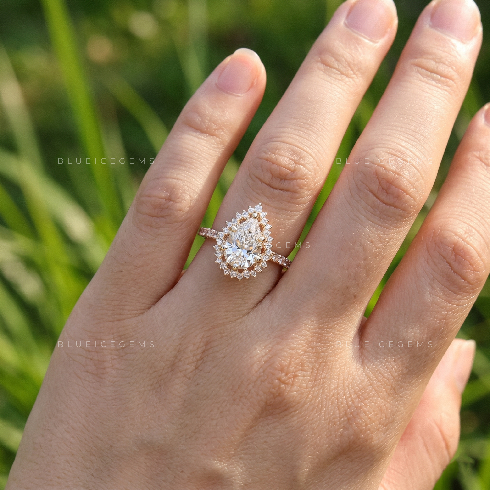 Graceful Pear Cut Halo Side Stone Engagement Ring