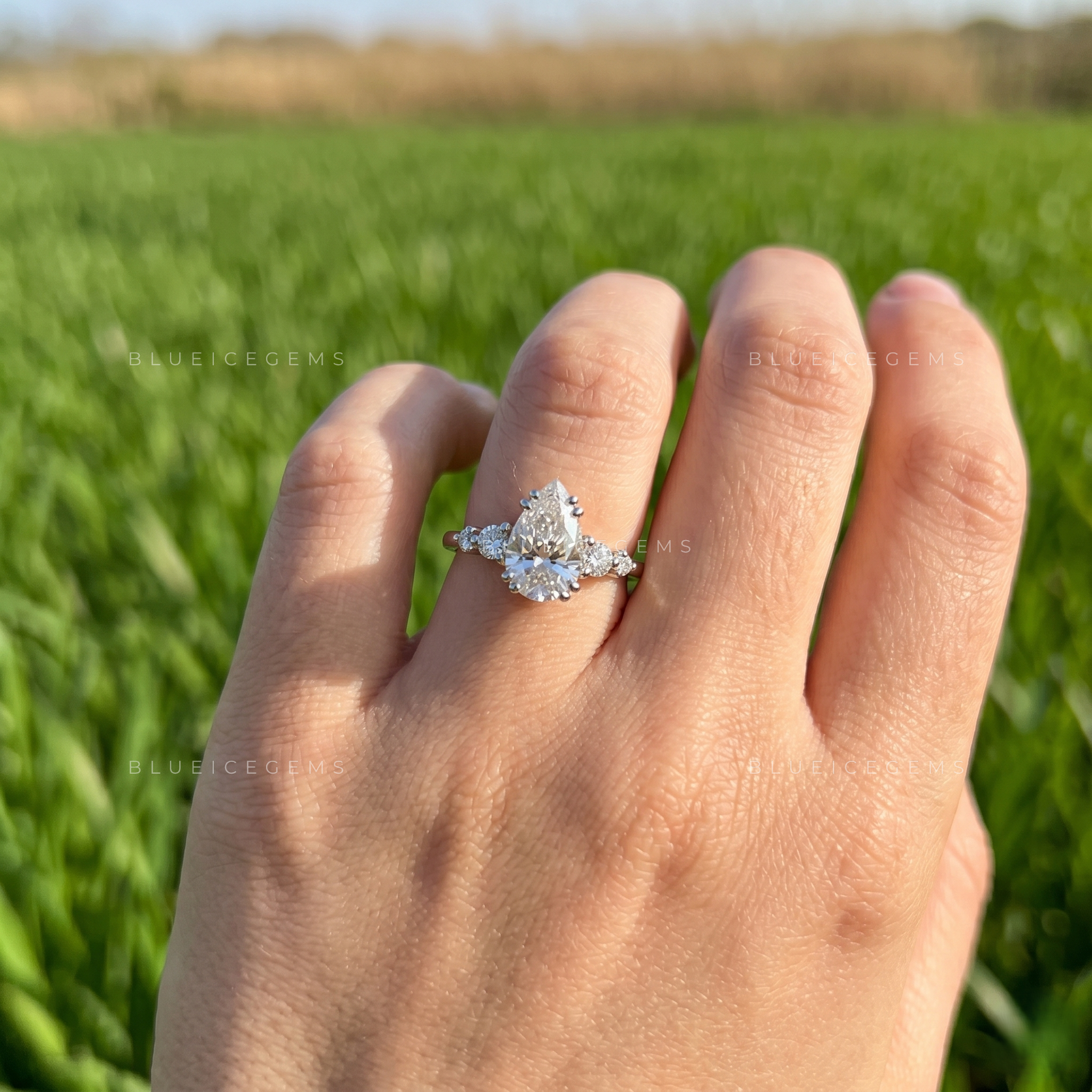 Unique Muse Pear Cut Five Stone Engagement Ring