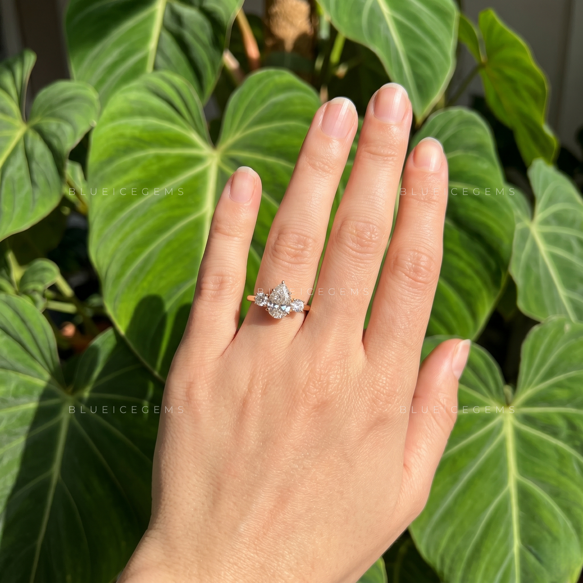 Whispering Romance Pear Cut Three-Stone Engagement Ring