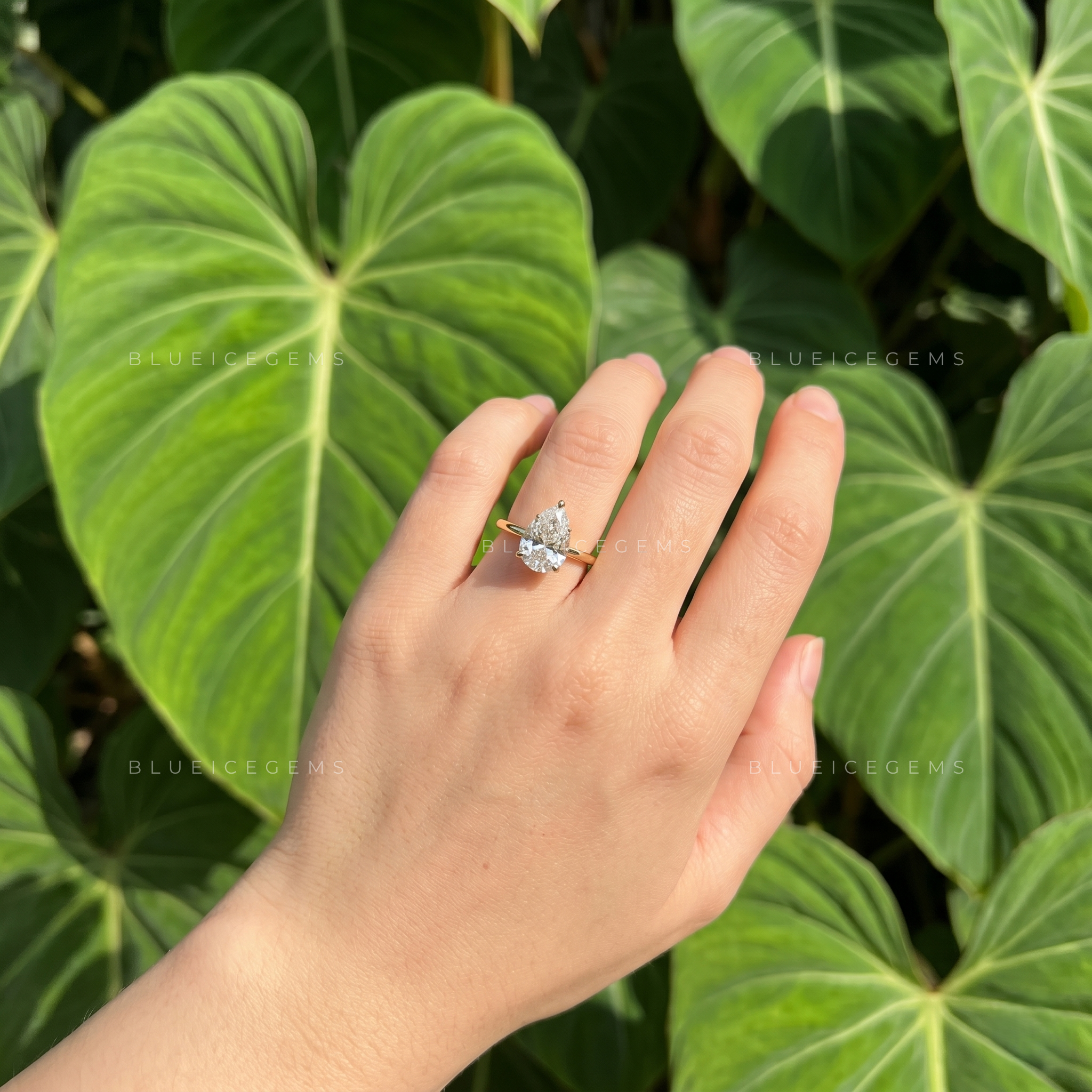 Whispering Grace Dainty Pear Cut Solitaire Engagement Ring