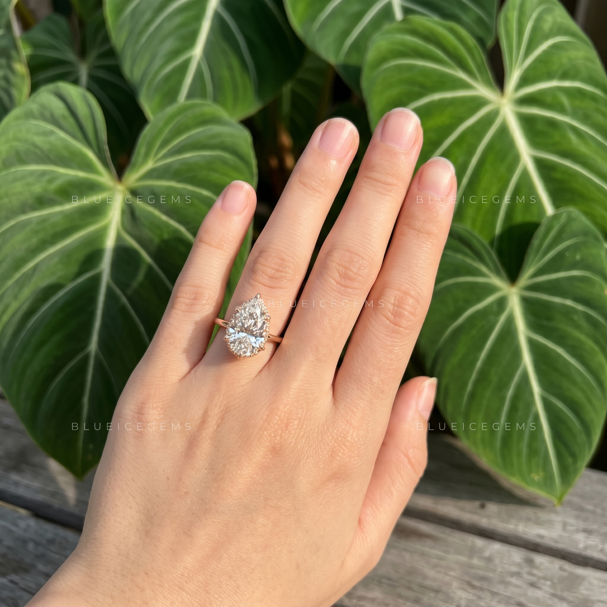 Nature Inspired Pear Cut Hidden Halo Leaf Prong Engagement Ring