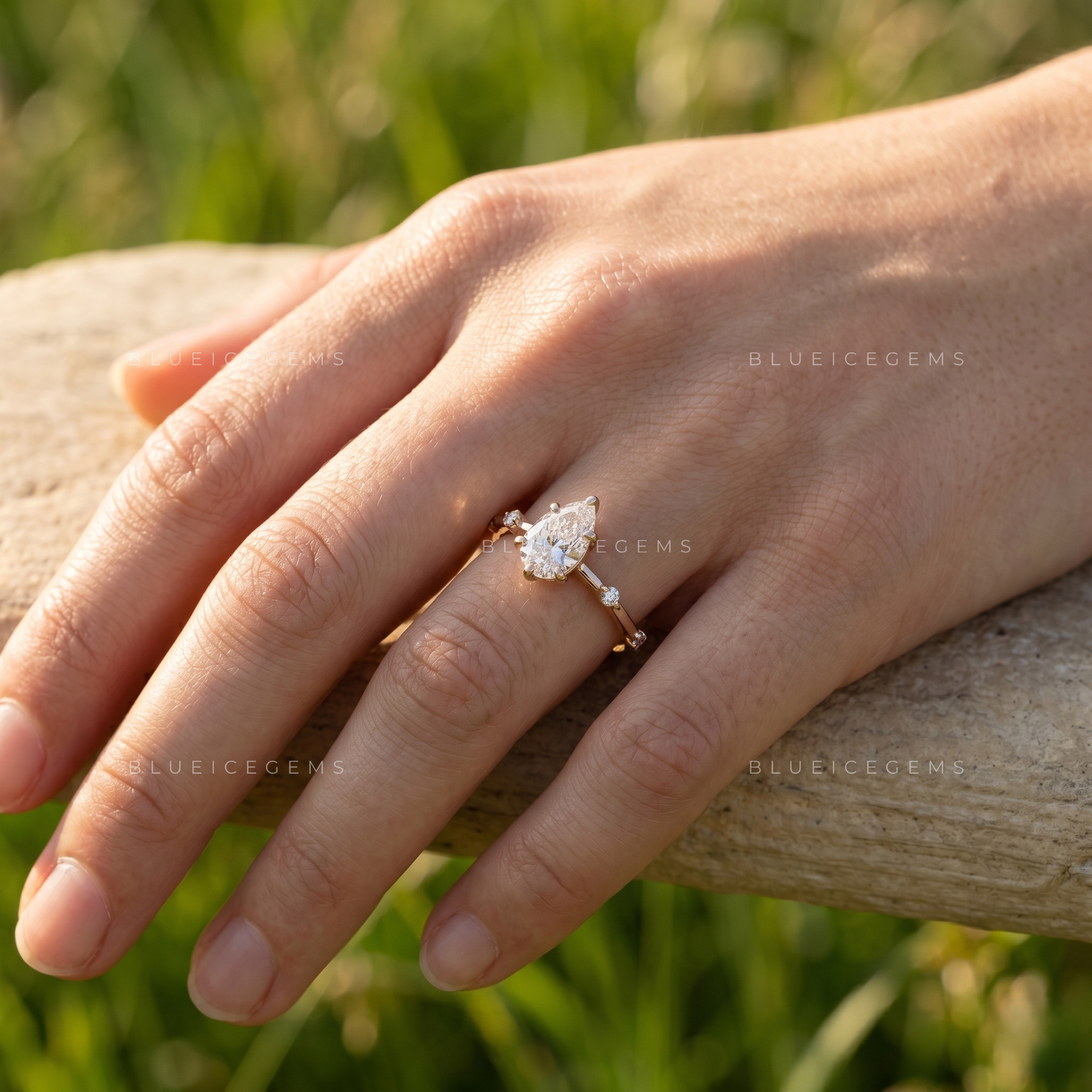 Elegant Grace Pear Cut Five Stone Accent Engagement Ring