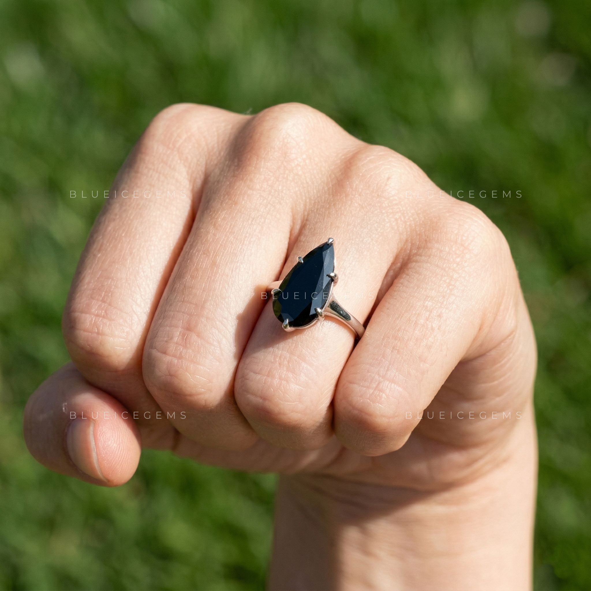 Midnight Noir Pear Cut Moissanite Solitaire Ring
