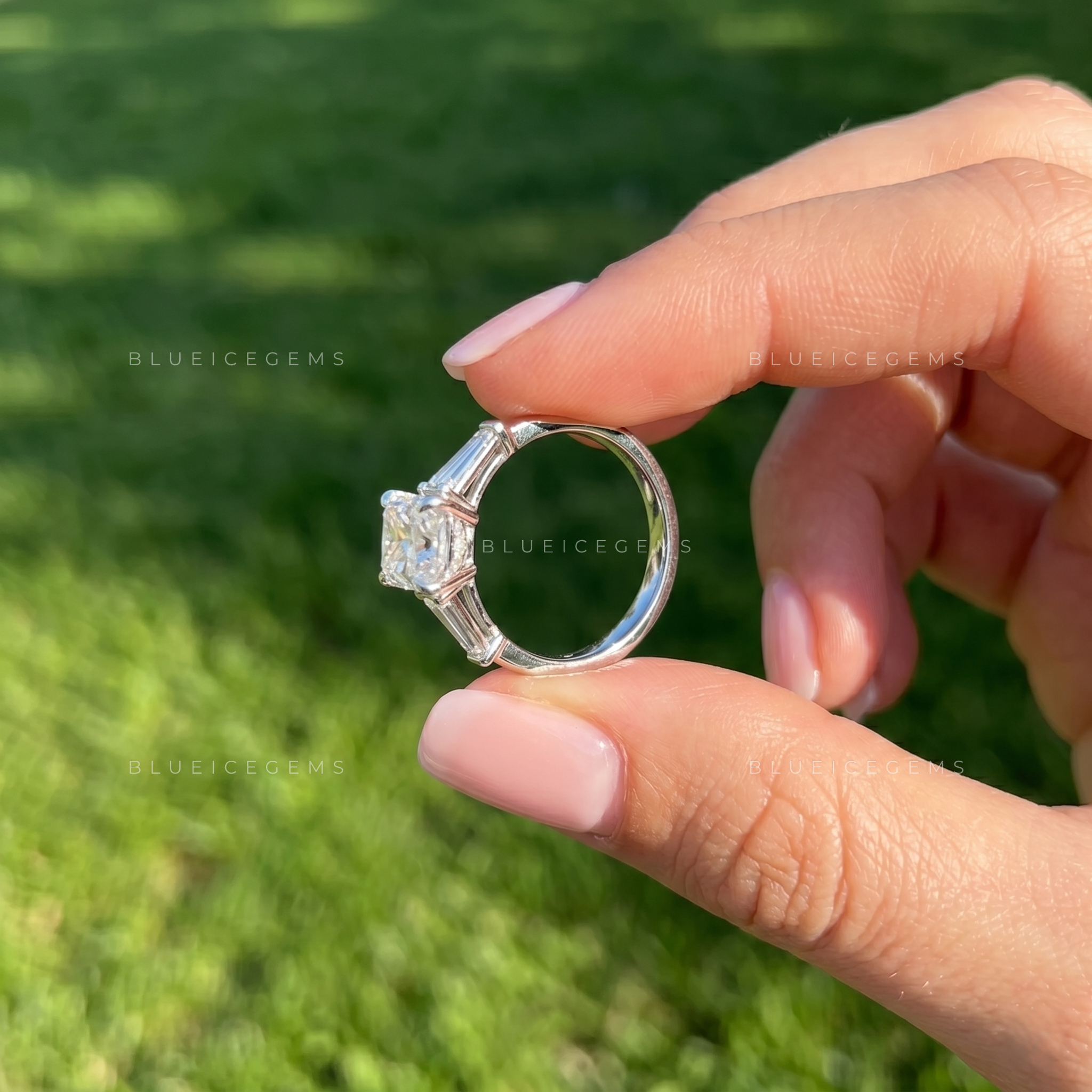 Classic Grace Emerald Cut Three Stone Engagement Ring