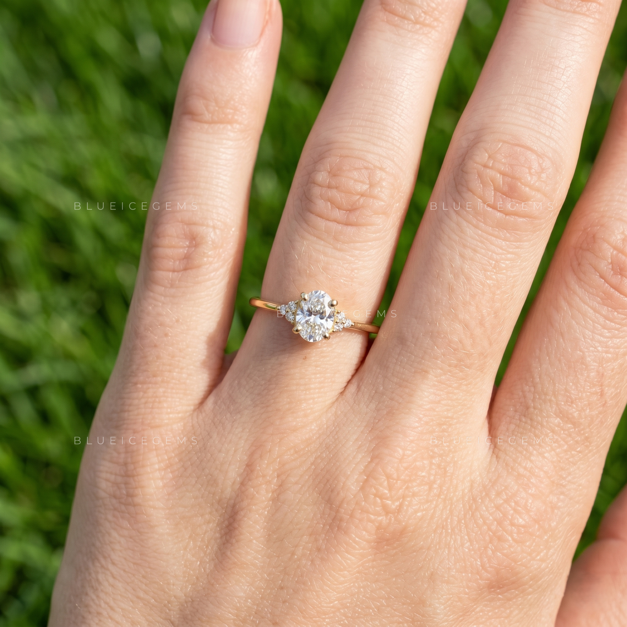 Elara Oval Cut Radiant Cluster Simulated Diamond Engagement Ring