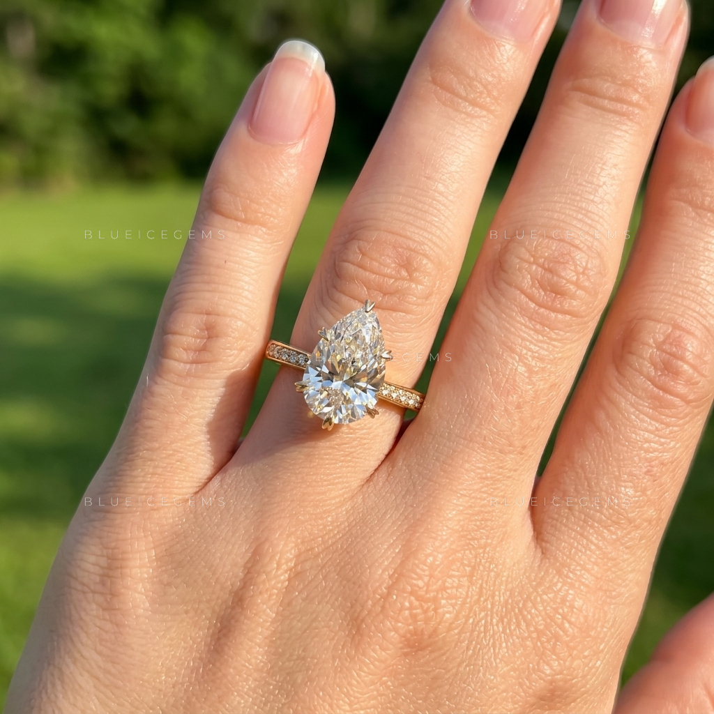 The "Signature Teardrop" Pear & Round Halo: Bold Elegance
