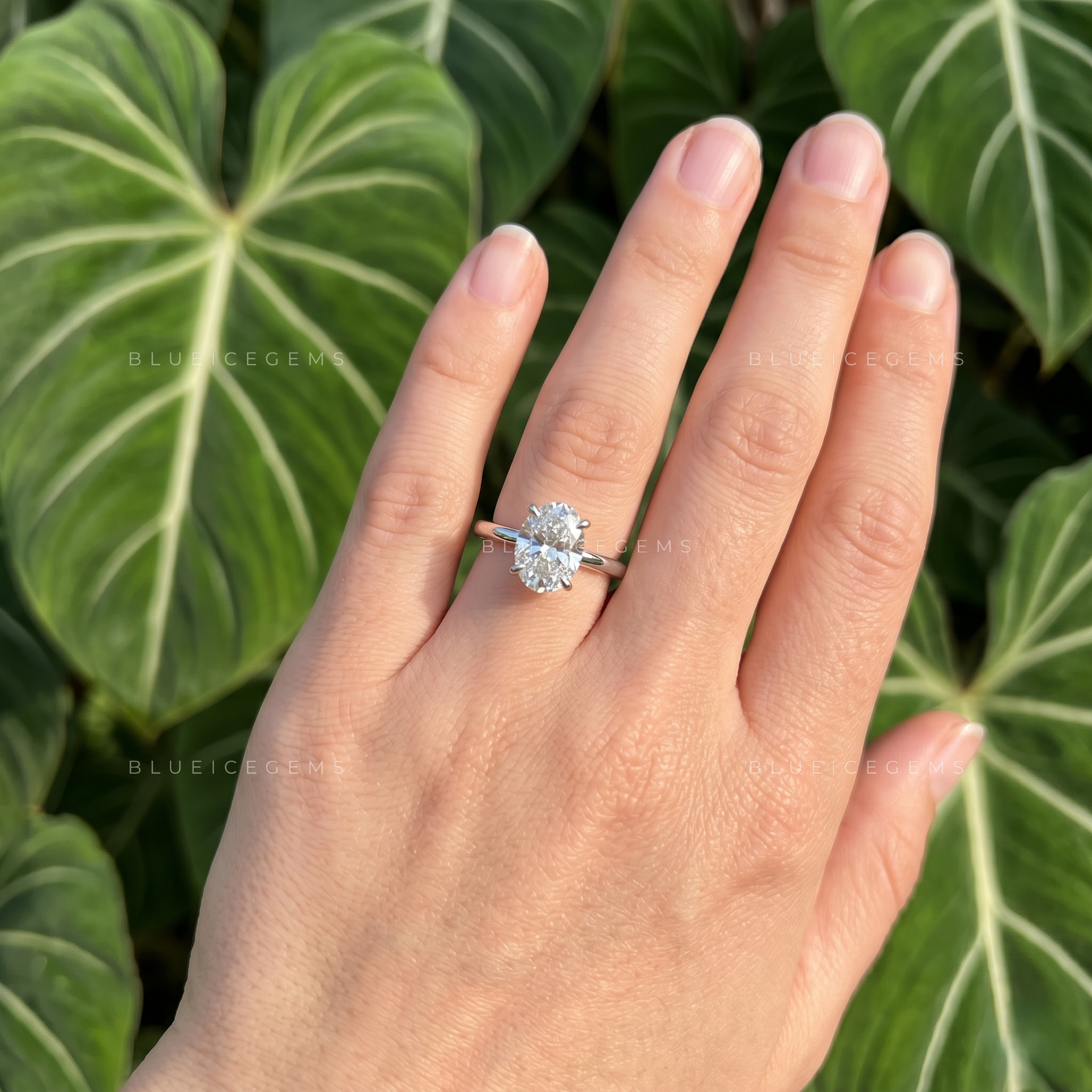Graceful Oval Brilliant Cut Claw Prong Solitaire Engagement Ring